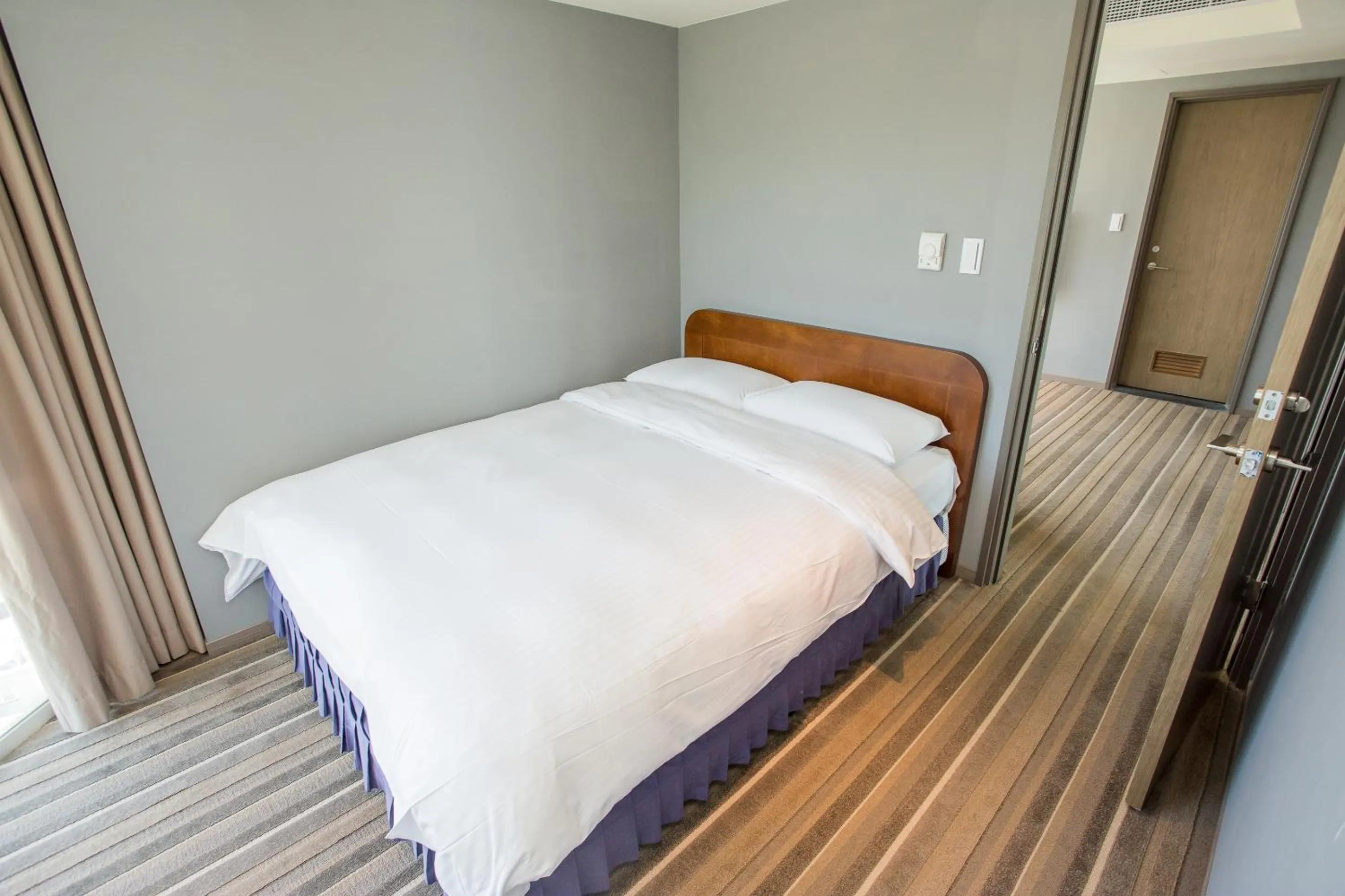 Bed in CT Green Bay Hot-Spring Hotel