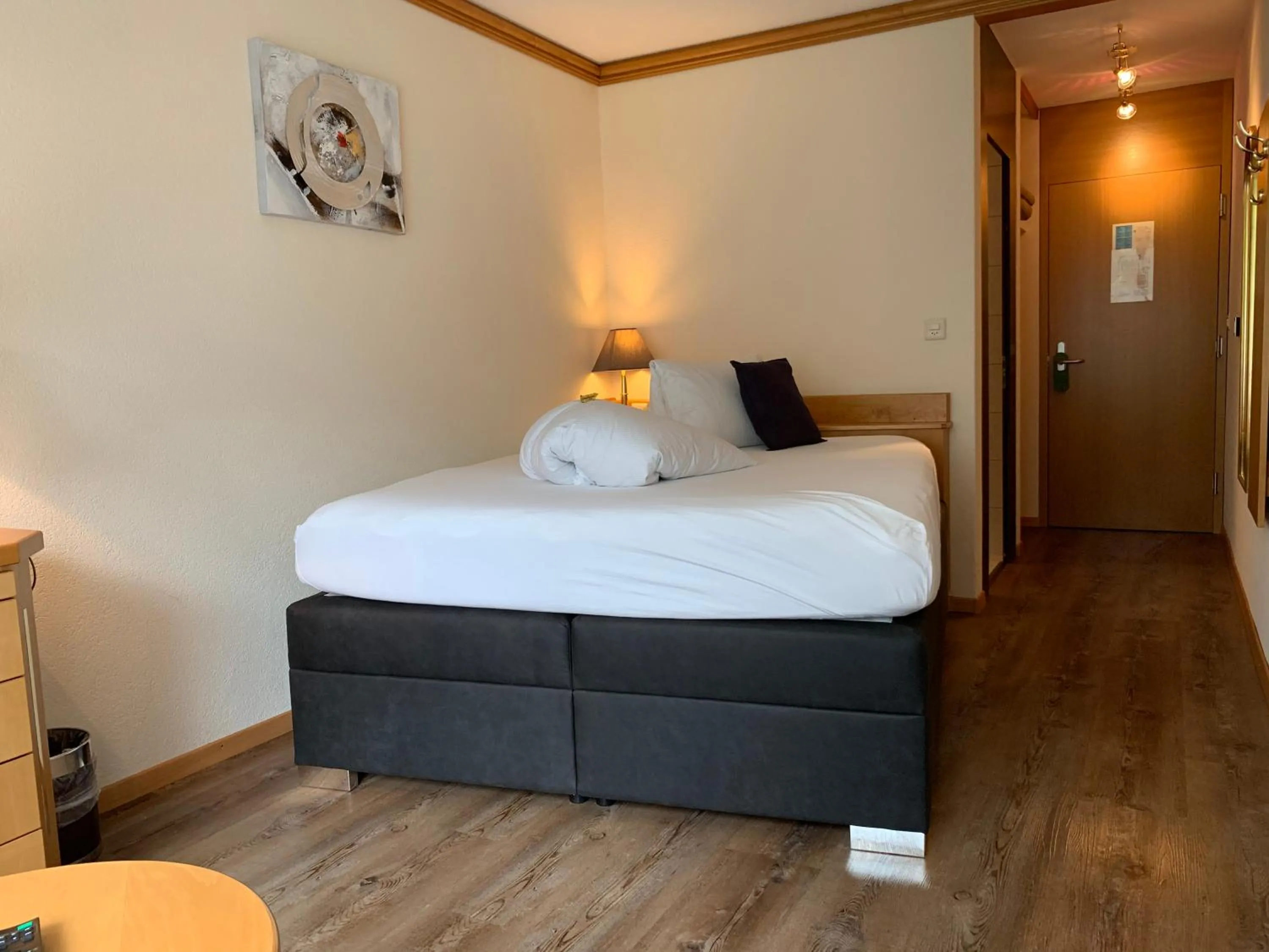 Photo of the whole room, Bed in Hotel Quellenhof Leukerbad