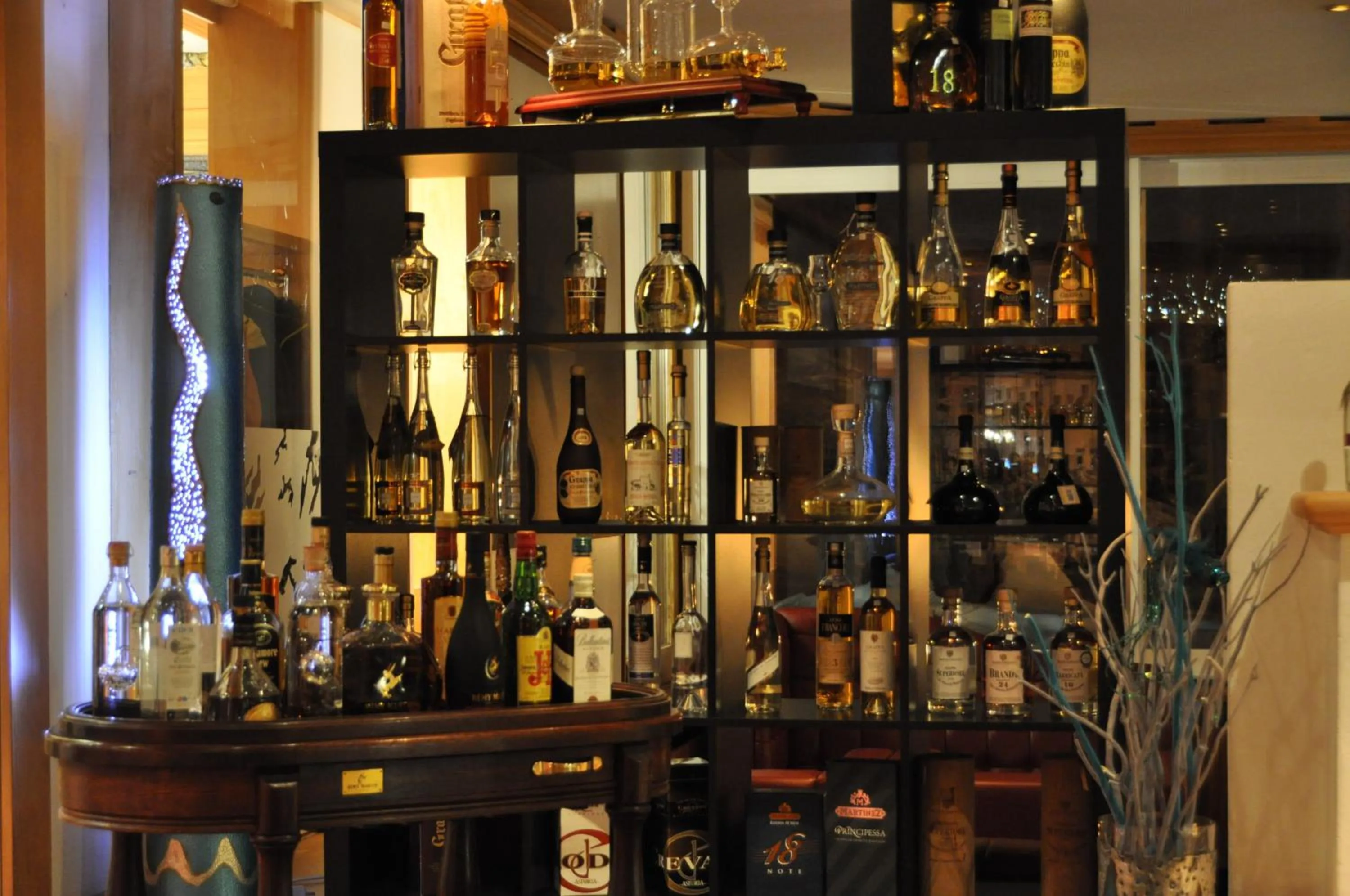 Lounge or bar in Hotel Quellenhof Leukerbad