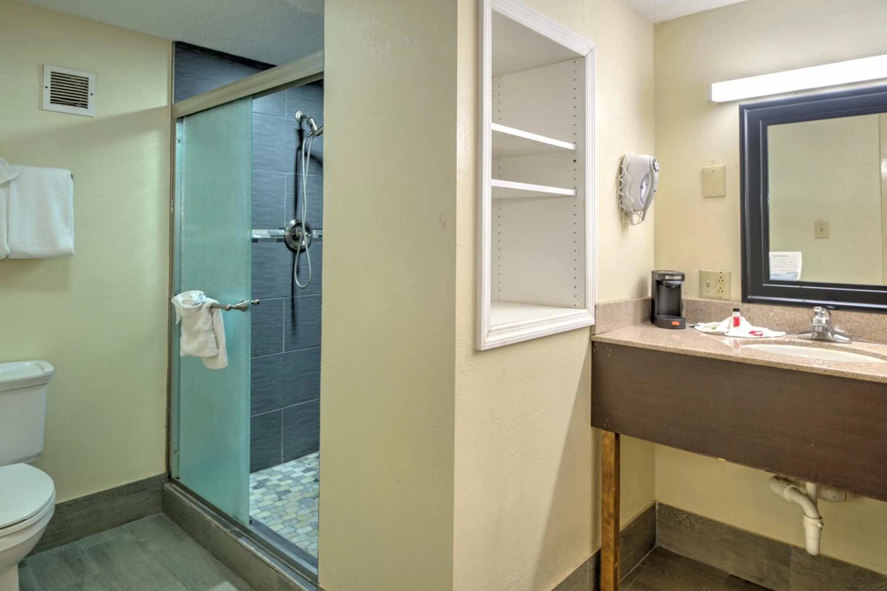 Bathroom in Super 8 by Wyndham Knoxville West/Farragut