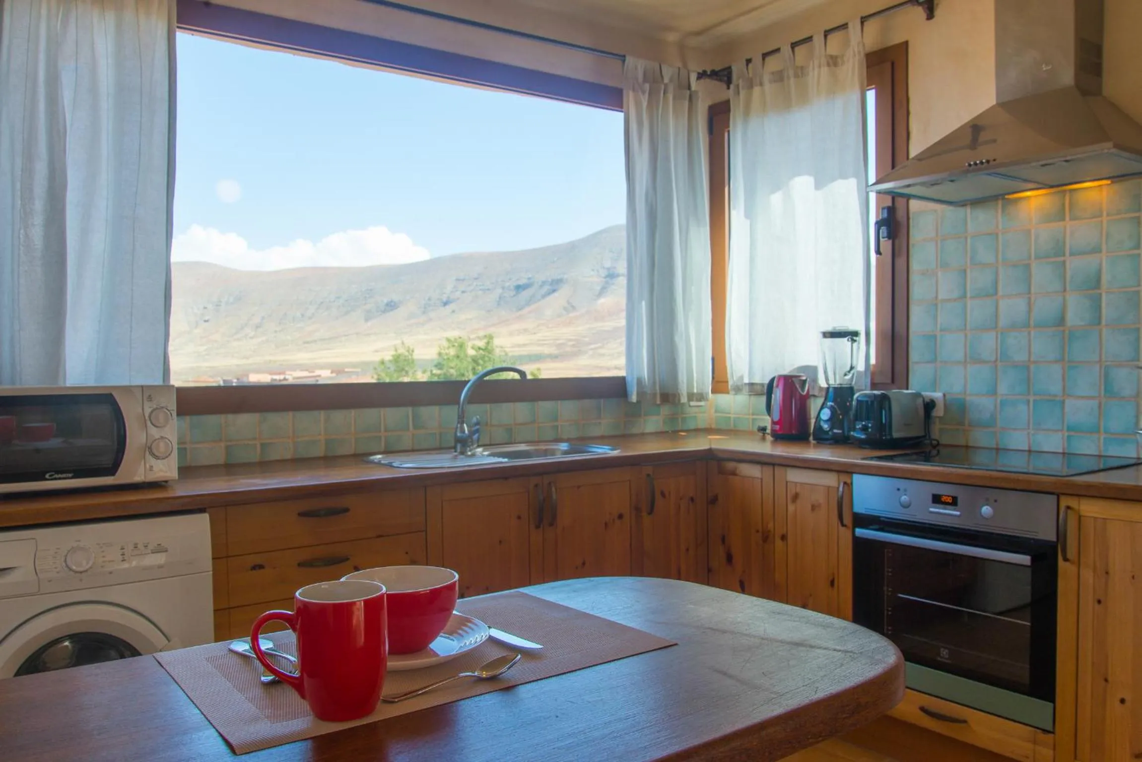Kitchen or kitchenette in Villa Upupa