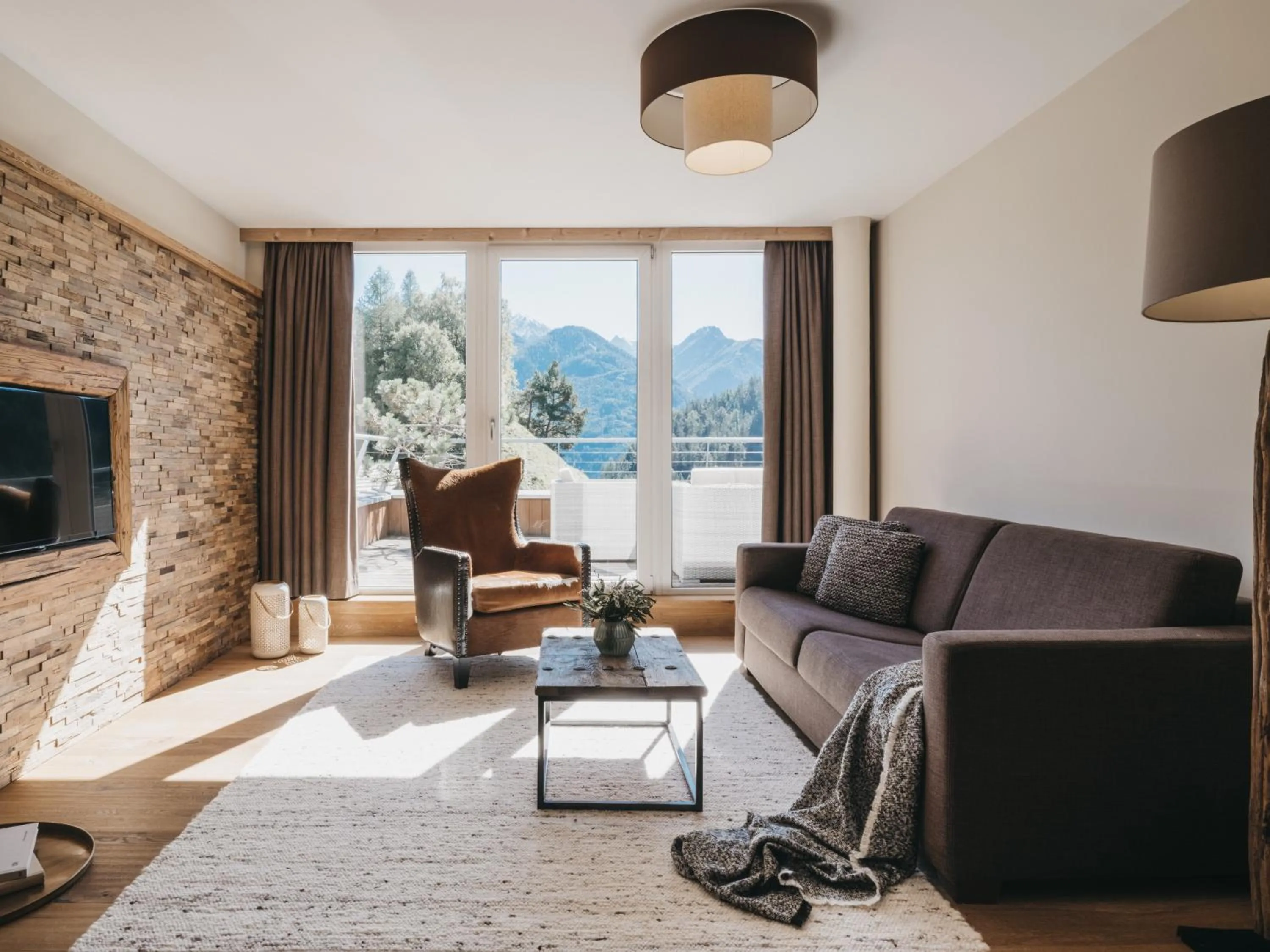 Communal lounge/ TV room in VAYA Terrazena Serfaus