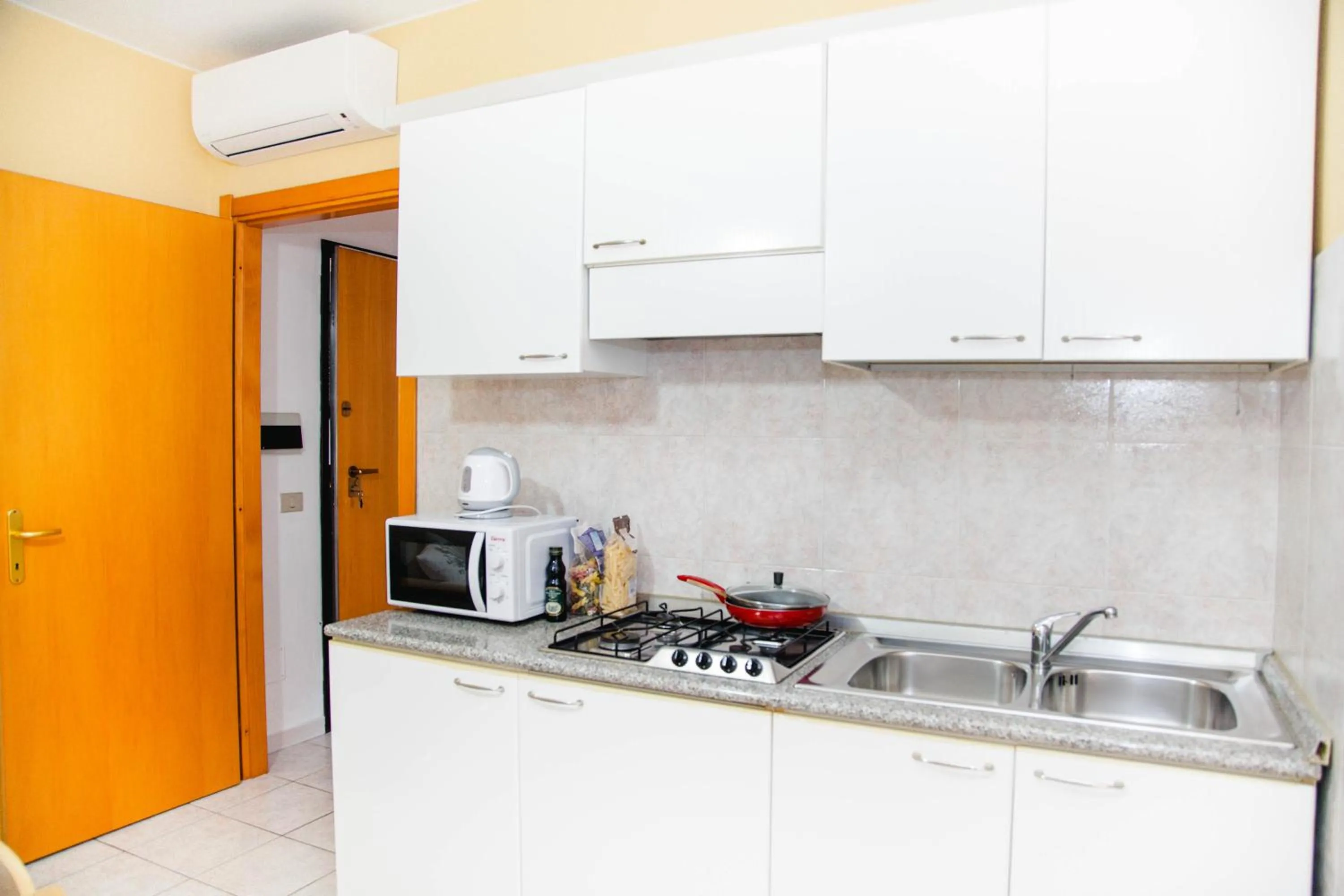 Kitchen or kitchenette in Casa Vacanze Cau