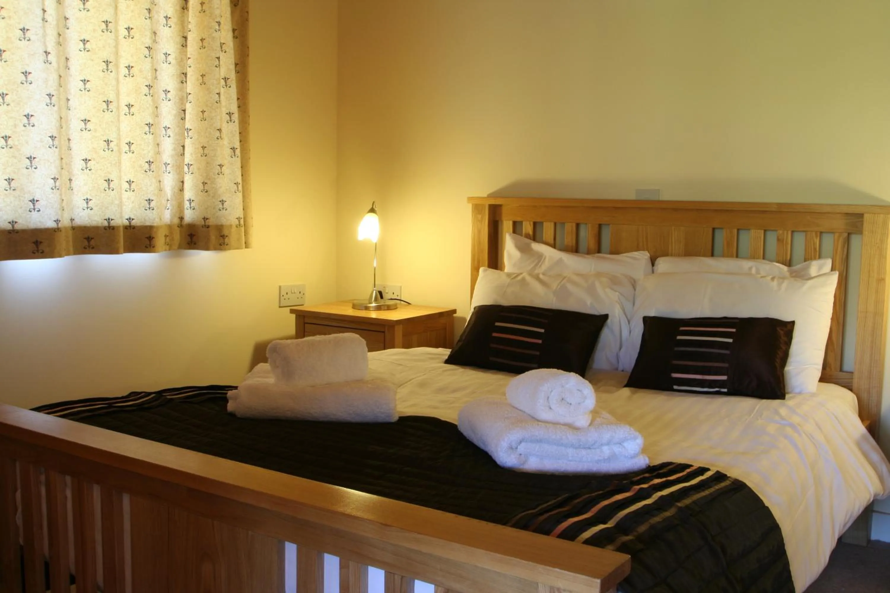 Bed in Logierait Pine Lodges