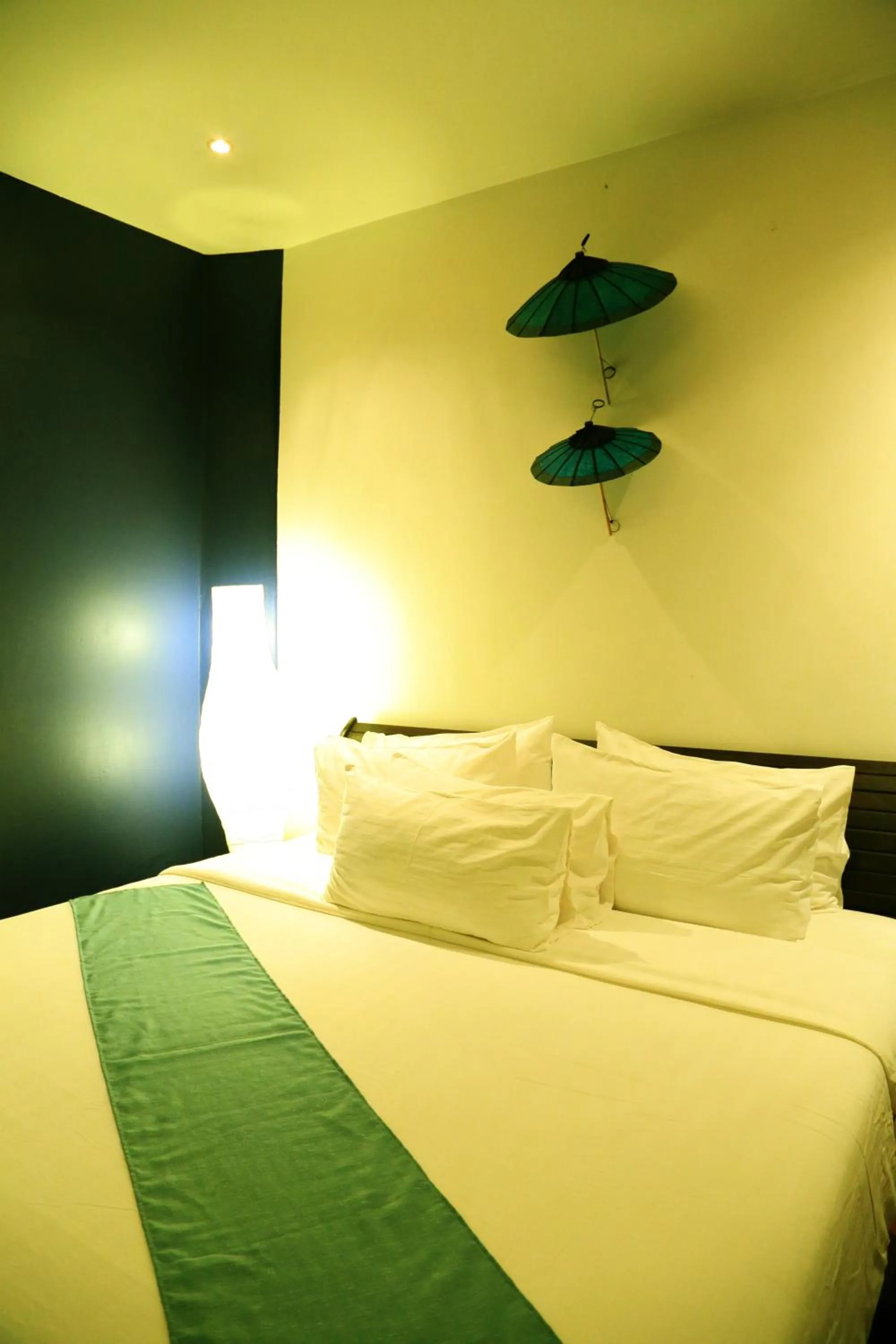 Bed in Indigo House Hotel