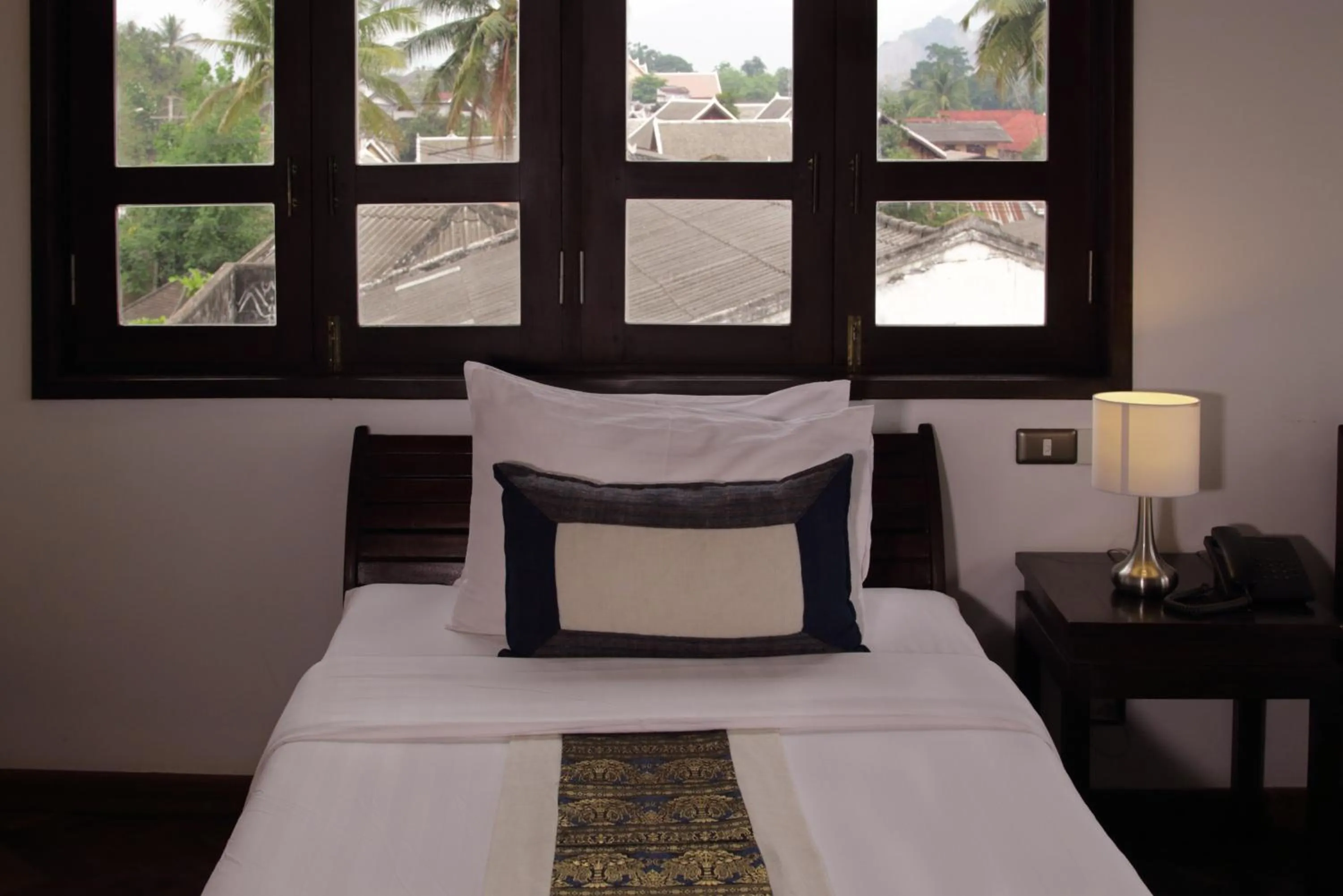Bed in Indigo House Hotel