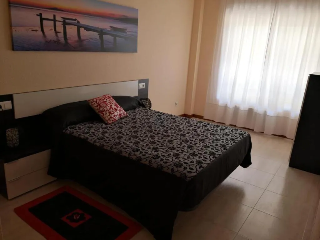 Bed in Apartamento playa Samil