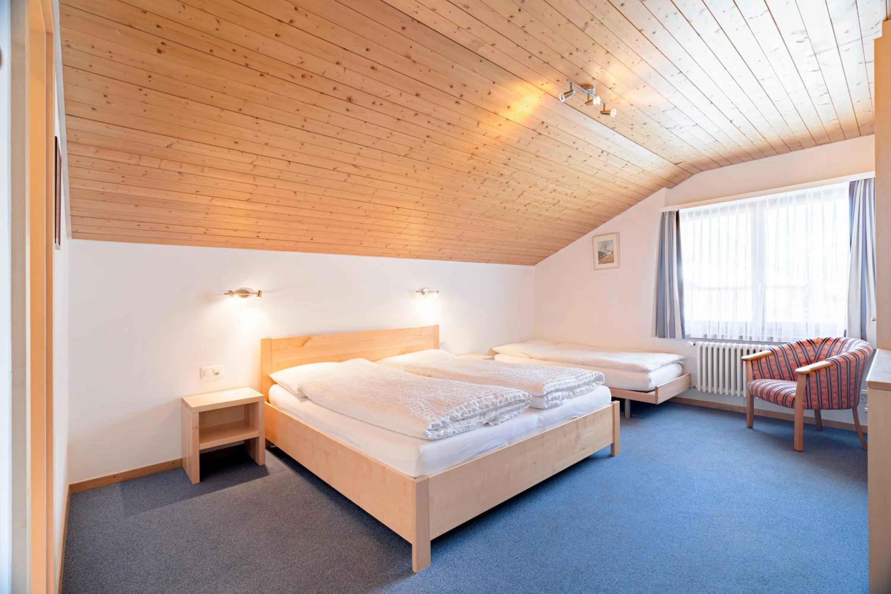 Bed in Hotel Parnass