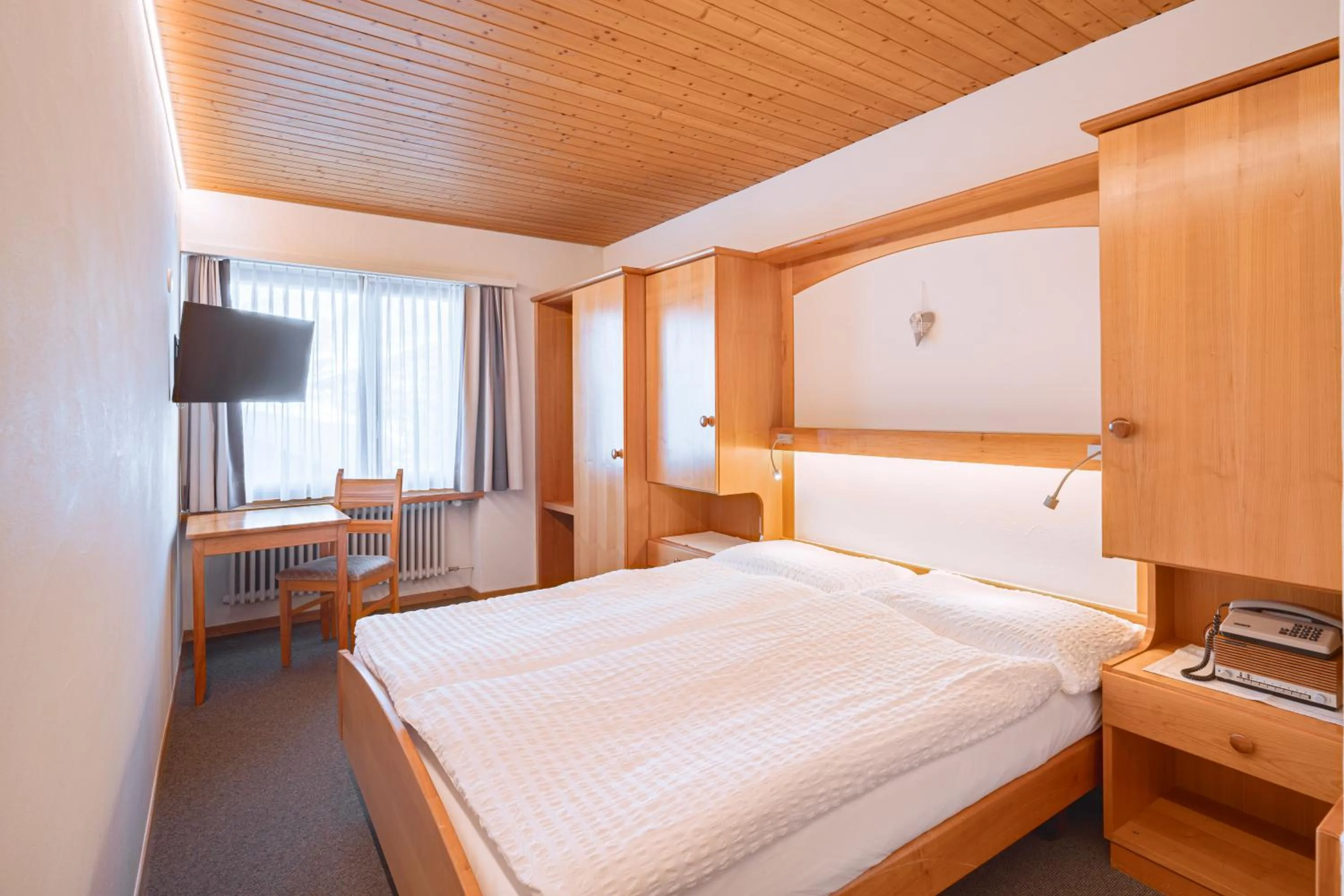 Bedroom, Bed in Hotel Parnass