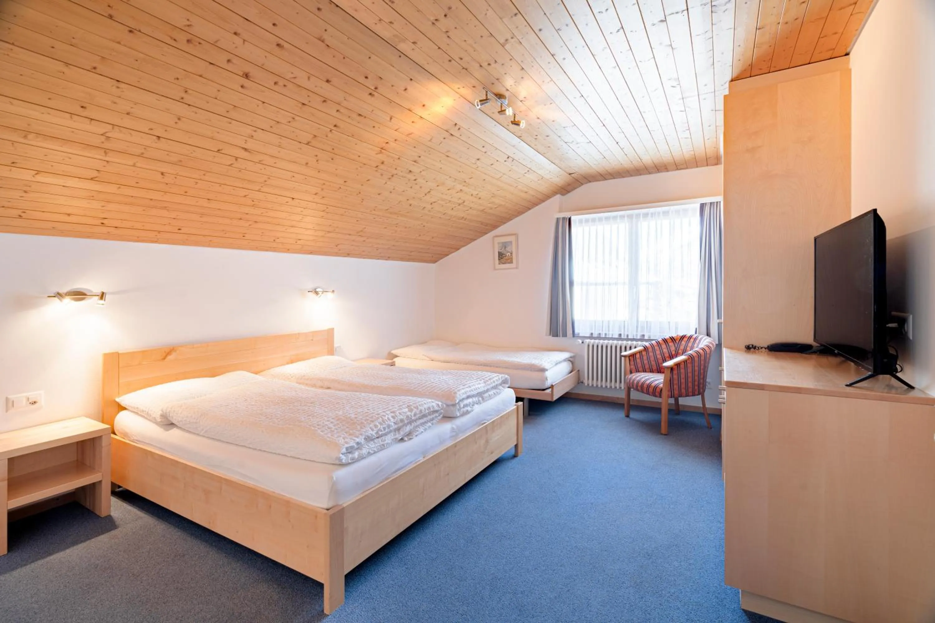 Bed in Hotel Parnass