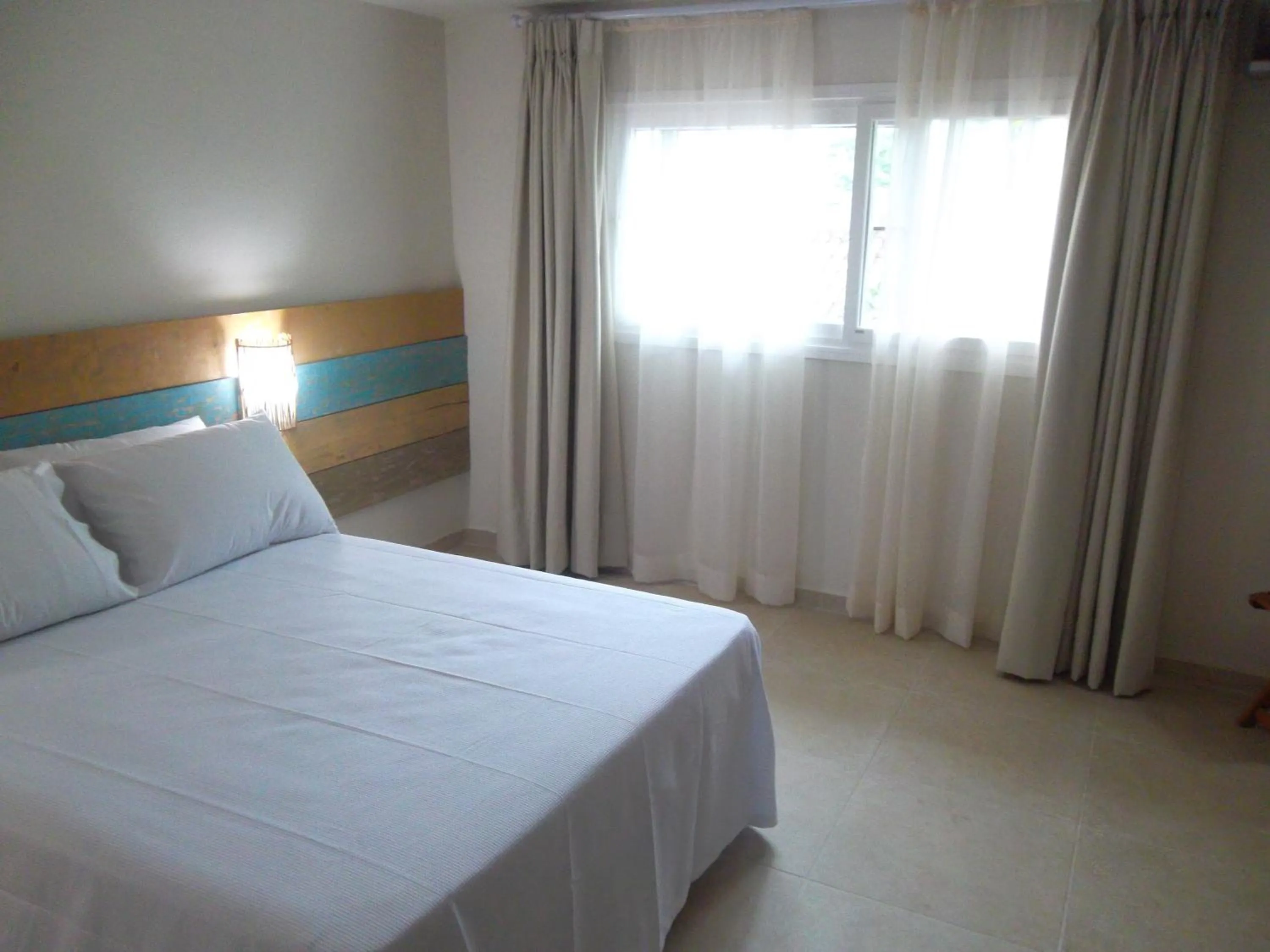 Bed in Ilha Deck Hotel