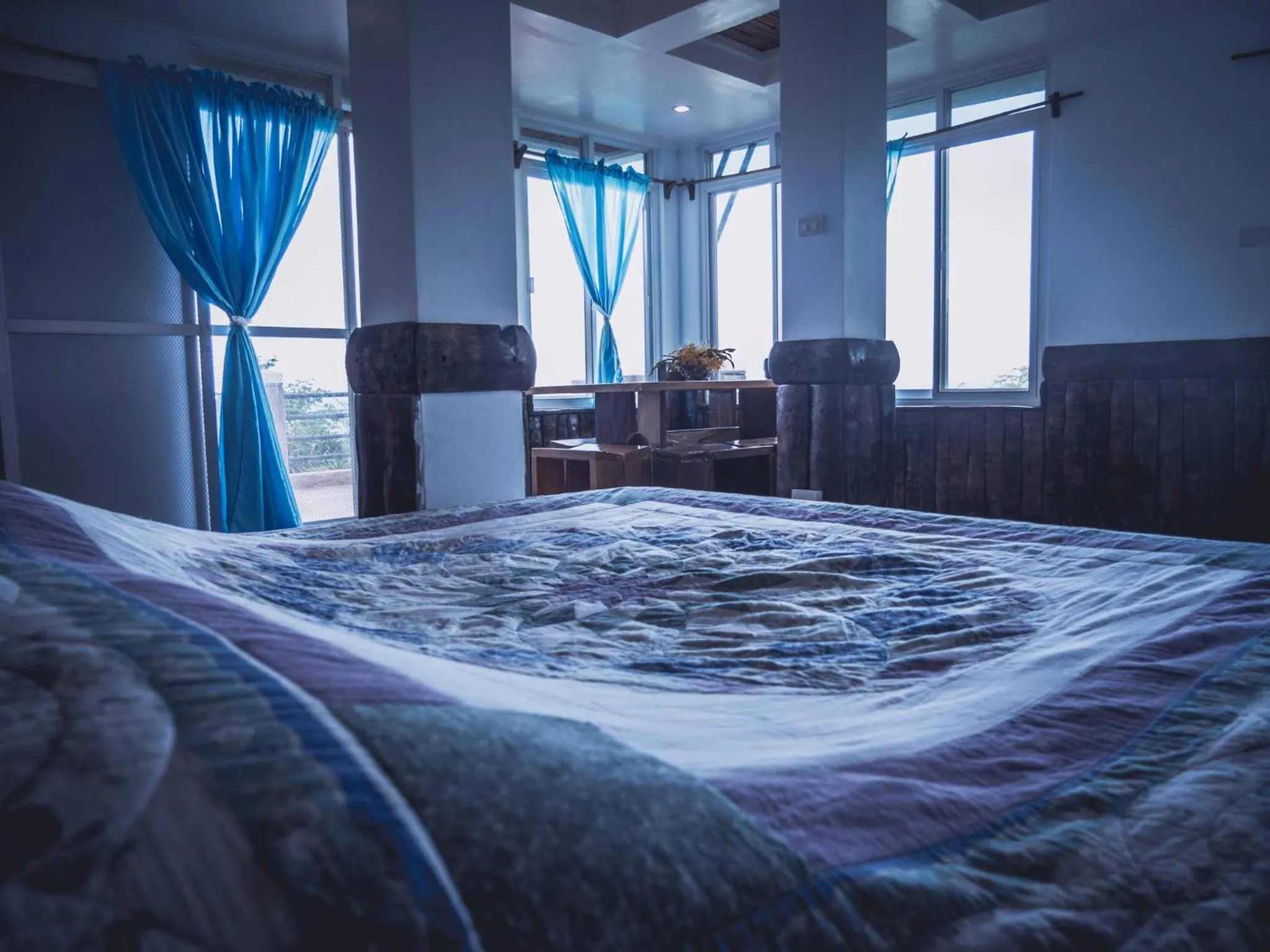 Bed in Nature's Eye Resort