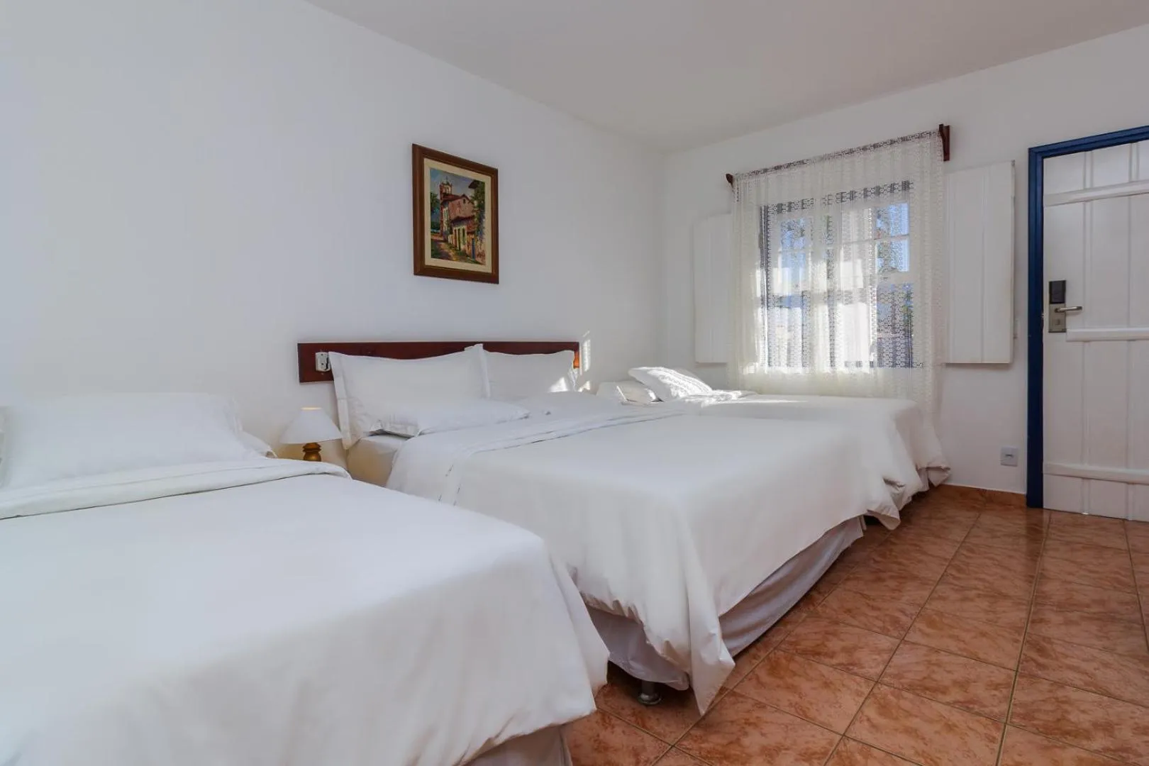 Bed in Pousada Aconchego