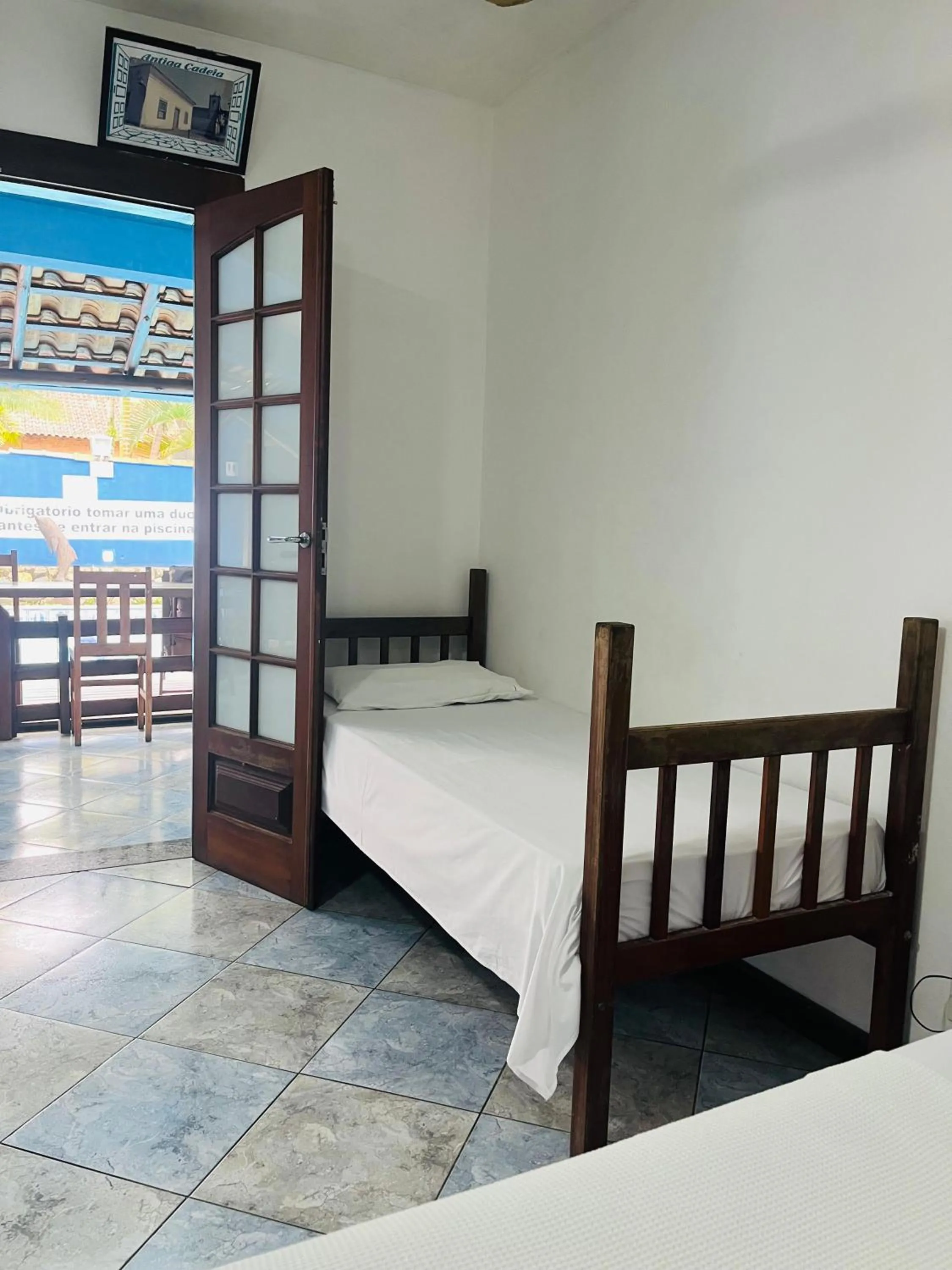 Bed in Pousada Aqui é Para-Ti