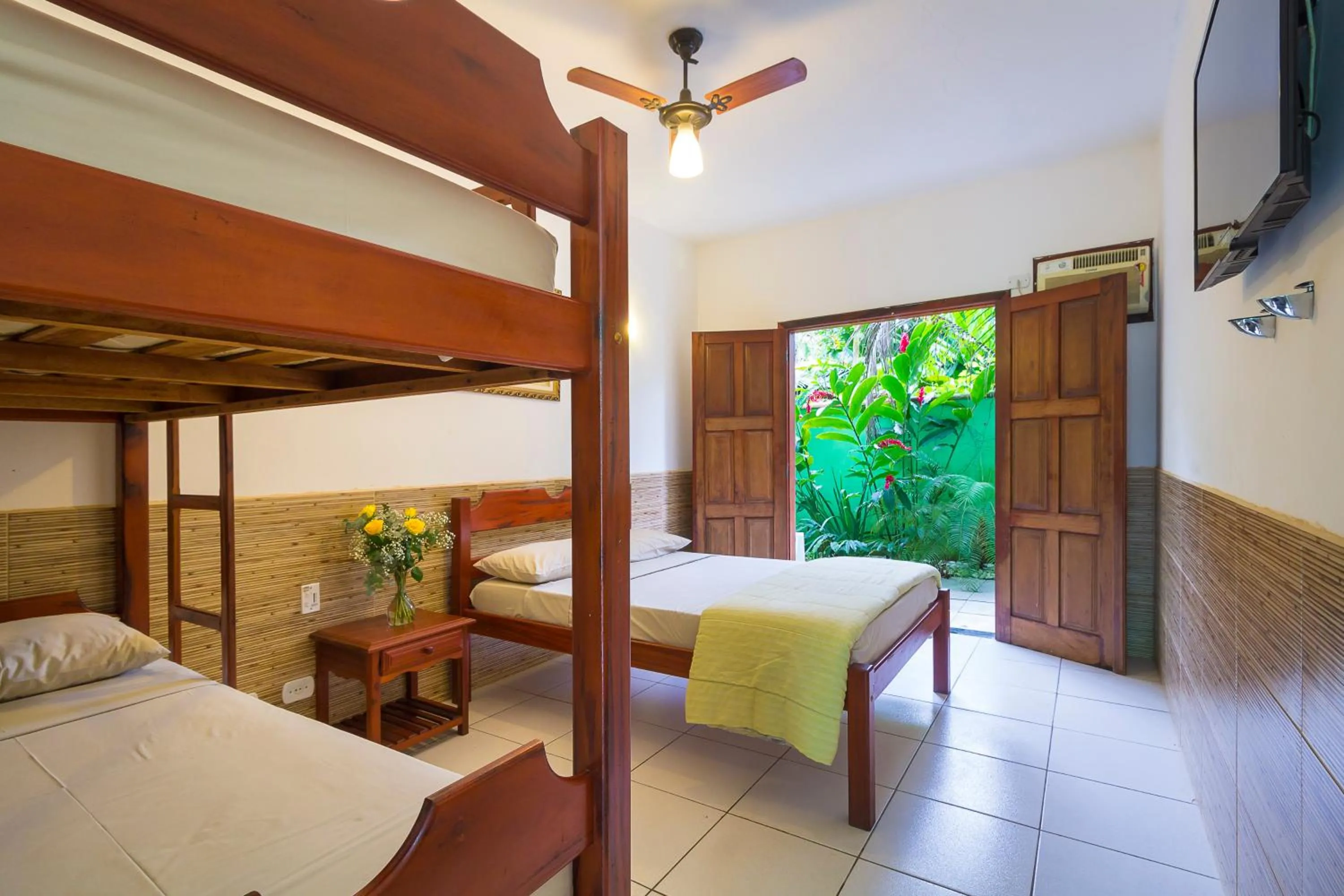 Bed in Pousada Camila