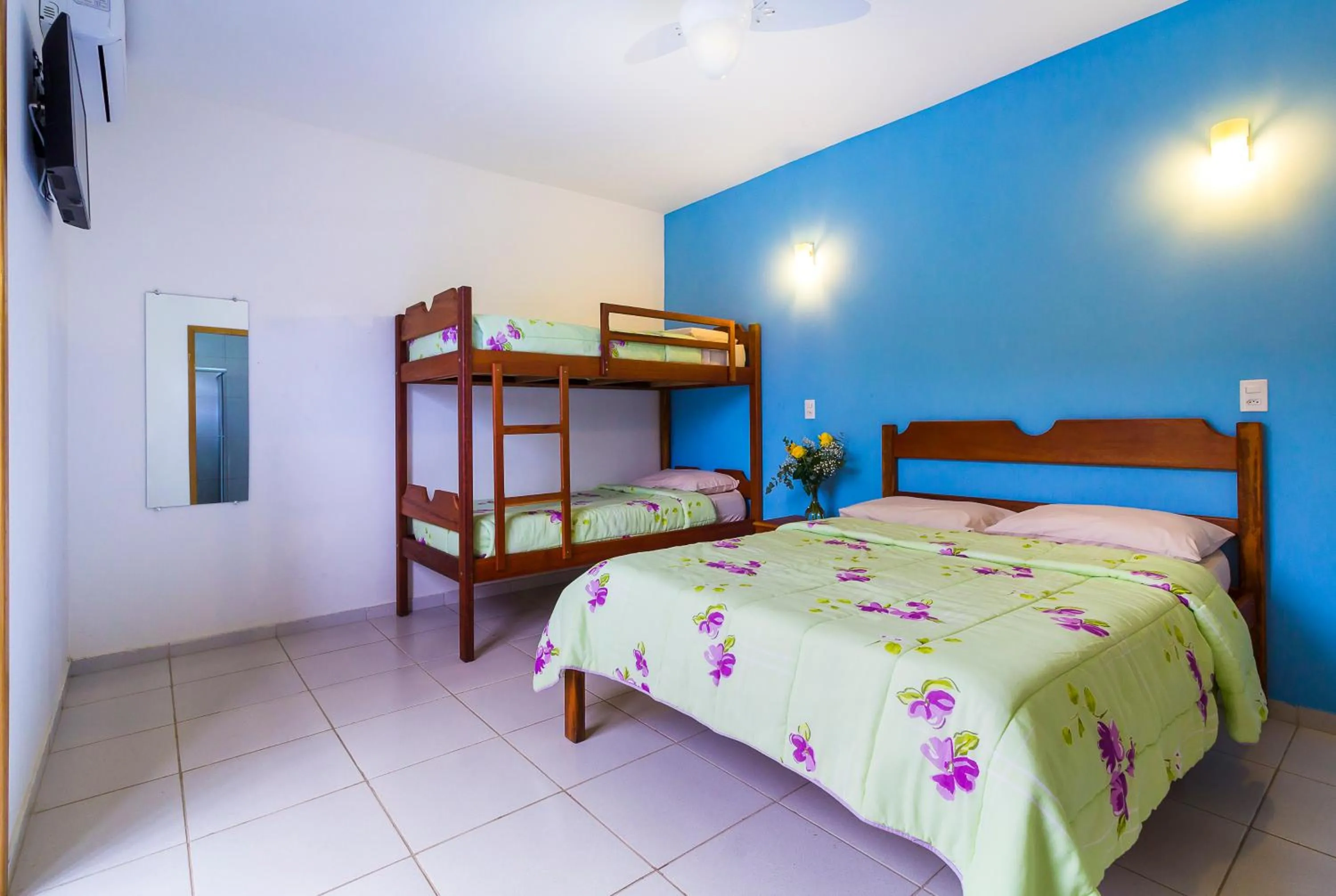 Bed in Pousada Camila