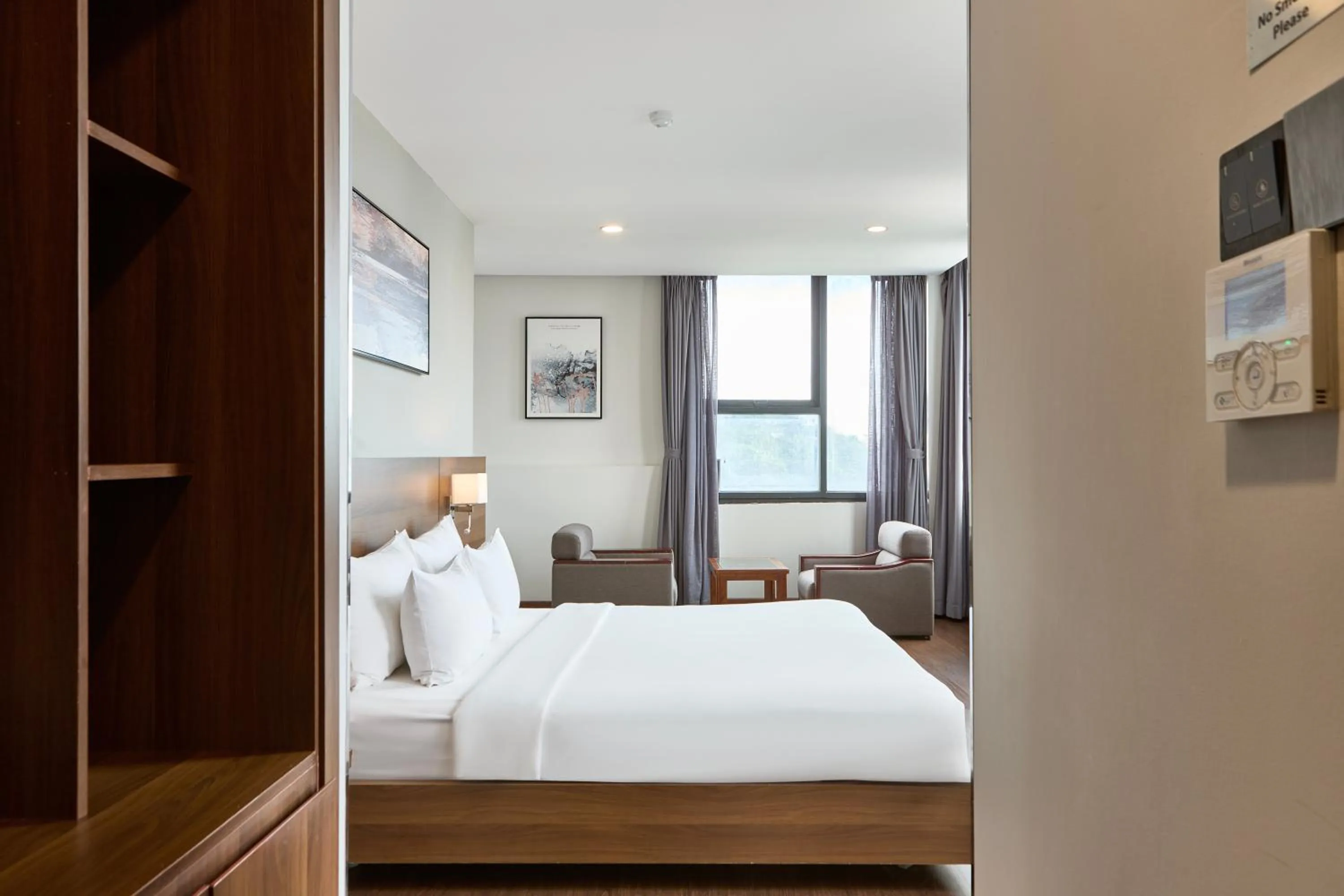 Bed in Central Park Saigon Hotel