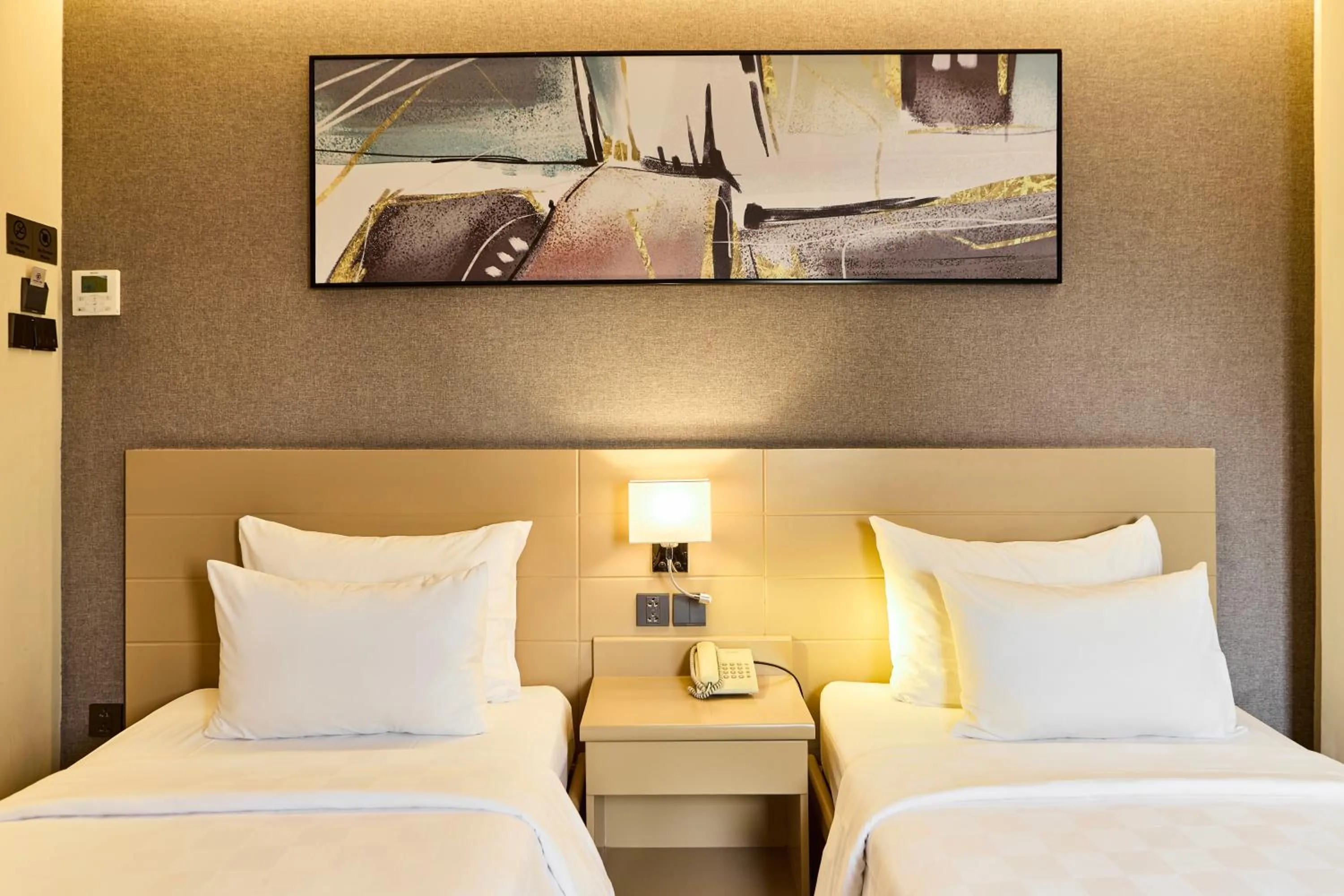 Bed in Central Park Saigon Hotel