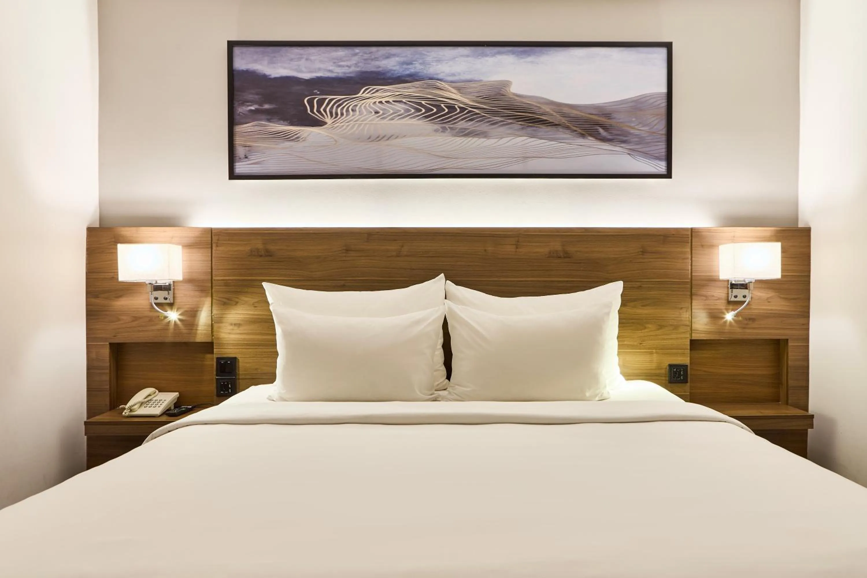 Bed in Central Park Saigon Hotel