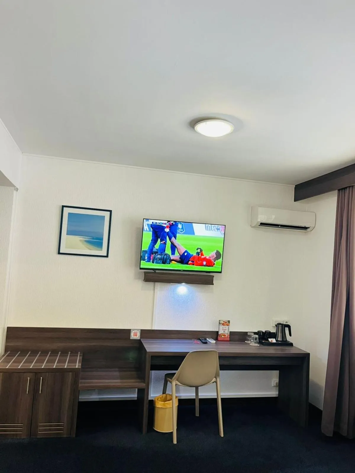 TV and multimedia in Hotel Le Paris