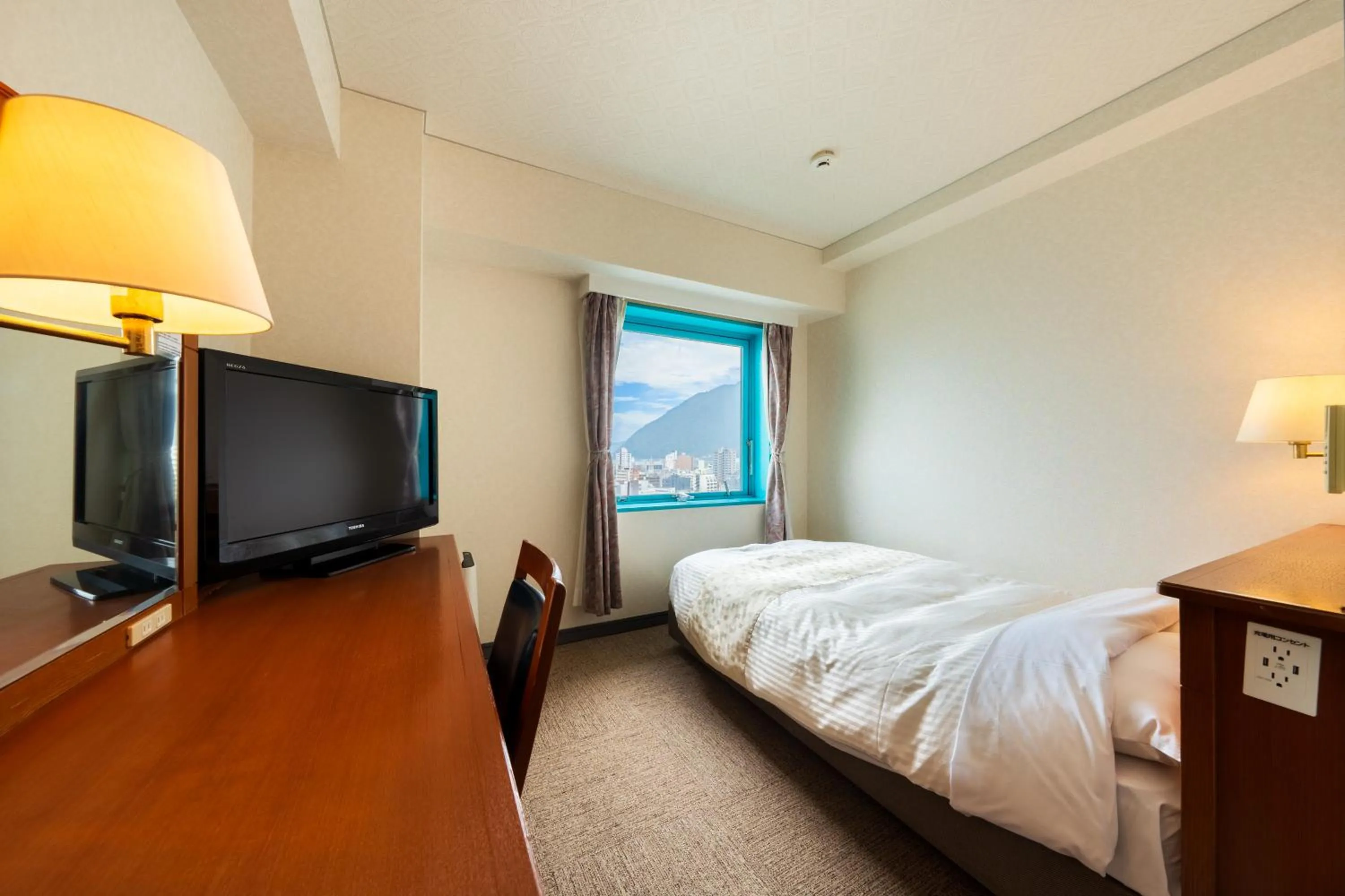 Photo of the whole room, Bed in Hotel Seawave Beppu