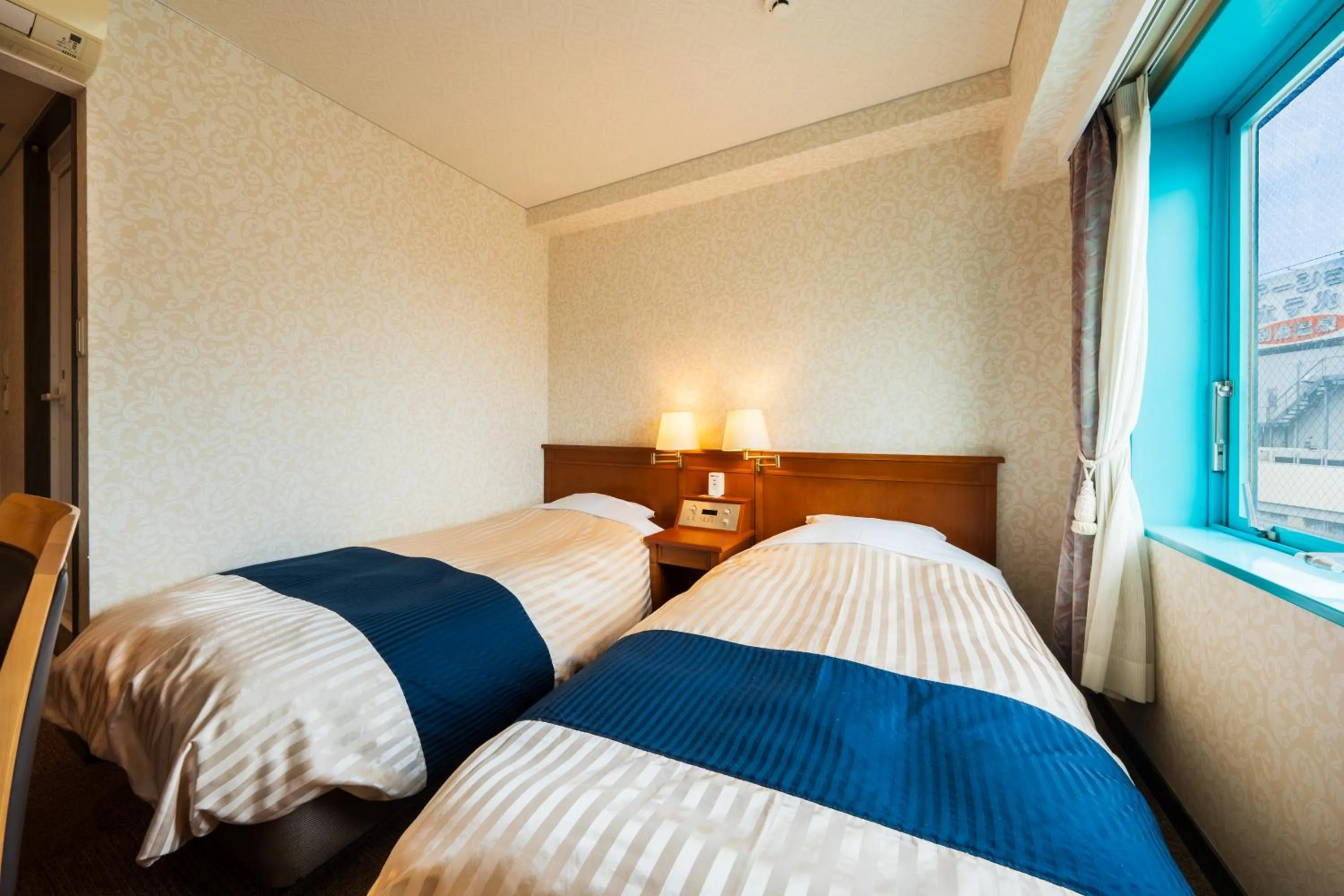 Bed in Hotel Seawave Beppu