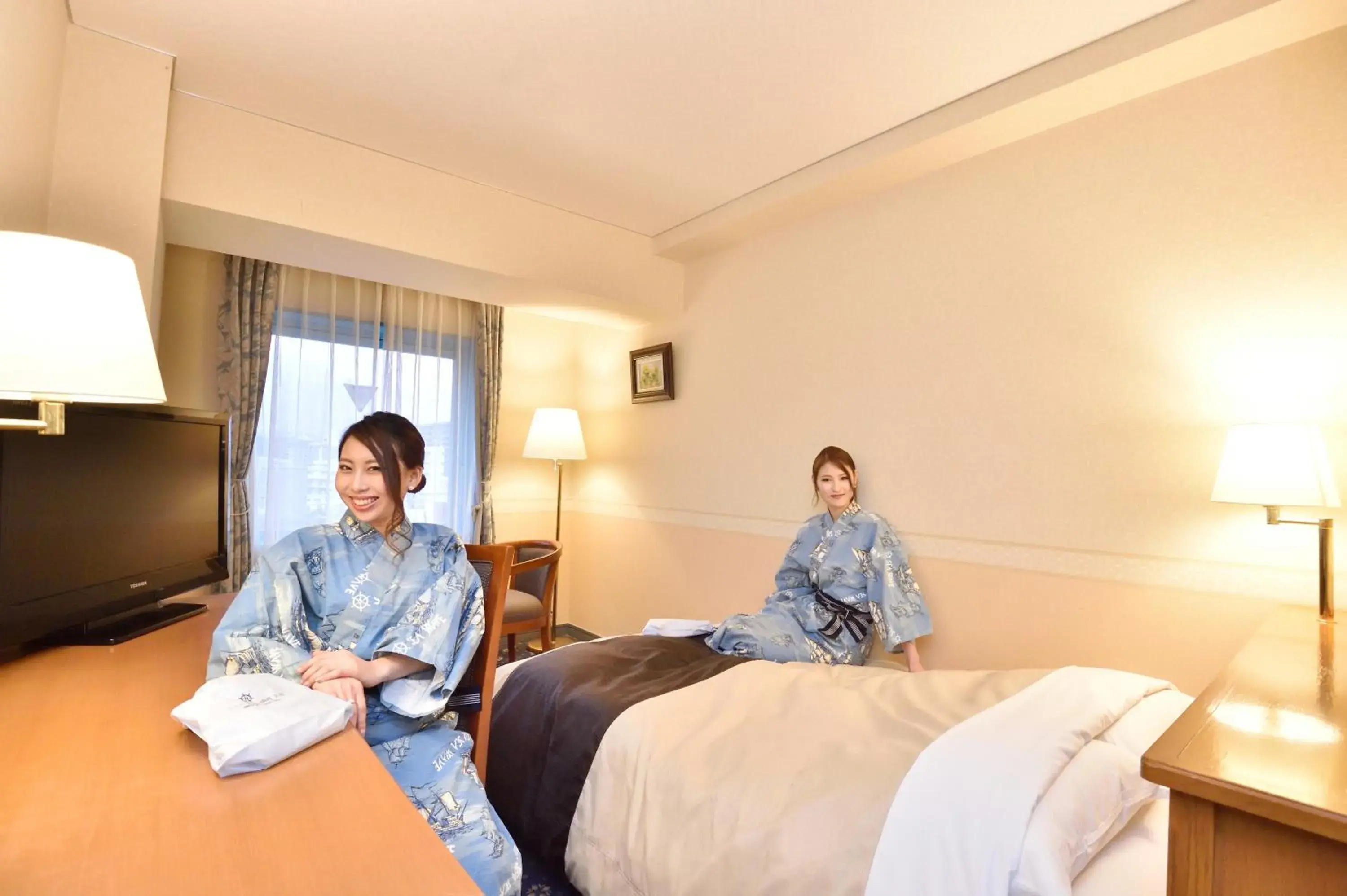 People, Bed in Hotel Seawave Beppu People, Bed in Hotel Seawave Beppu