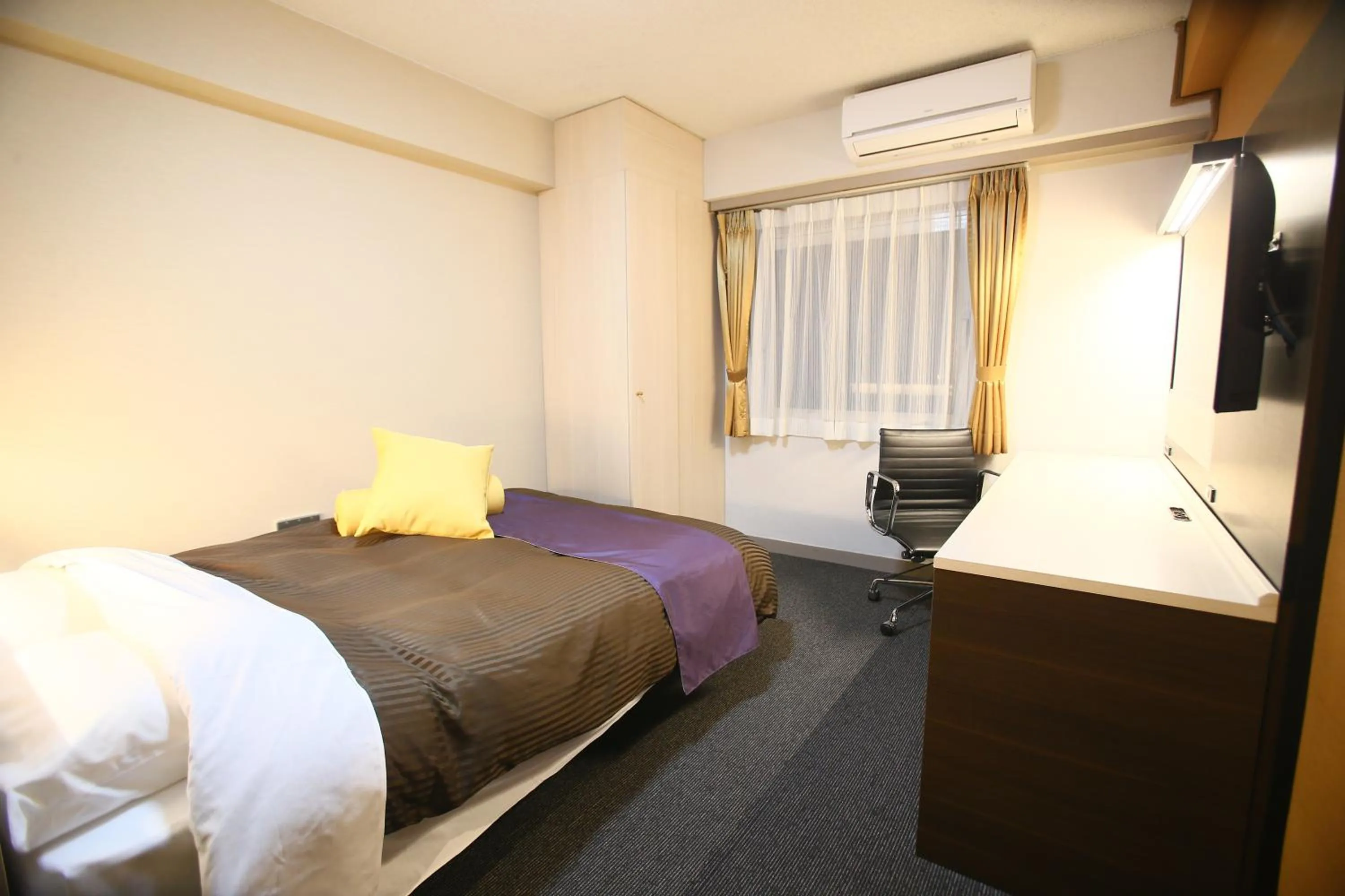 Bed in Hotel 1-2-3 Maebashi Mercury