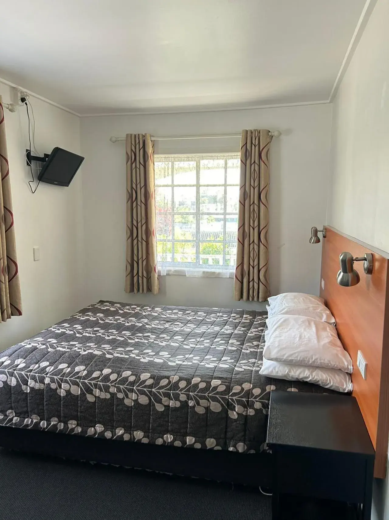 Bed in Tudor Motor Lodge Bed in Tudor Motor Lodge