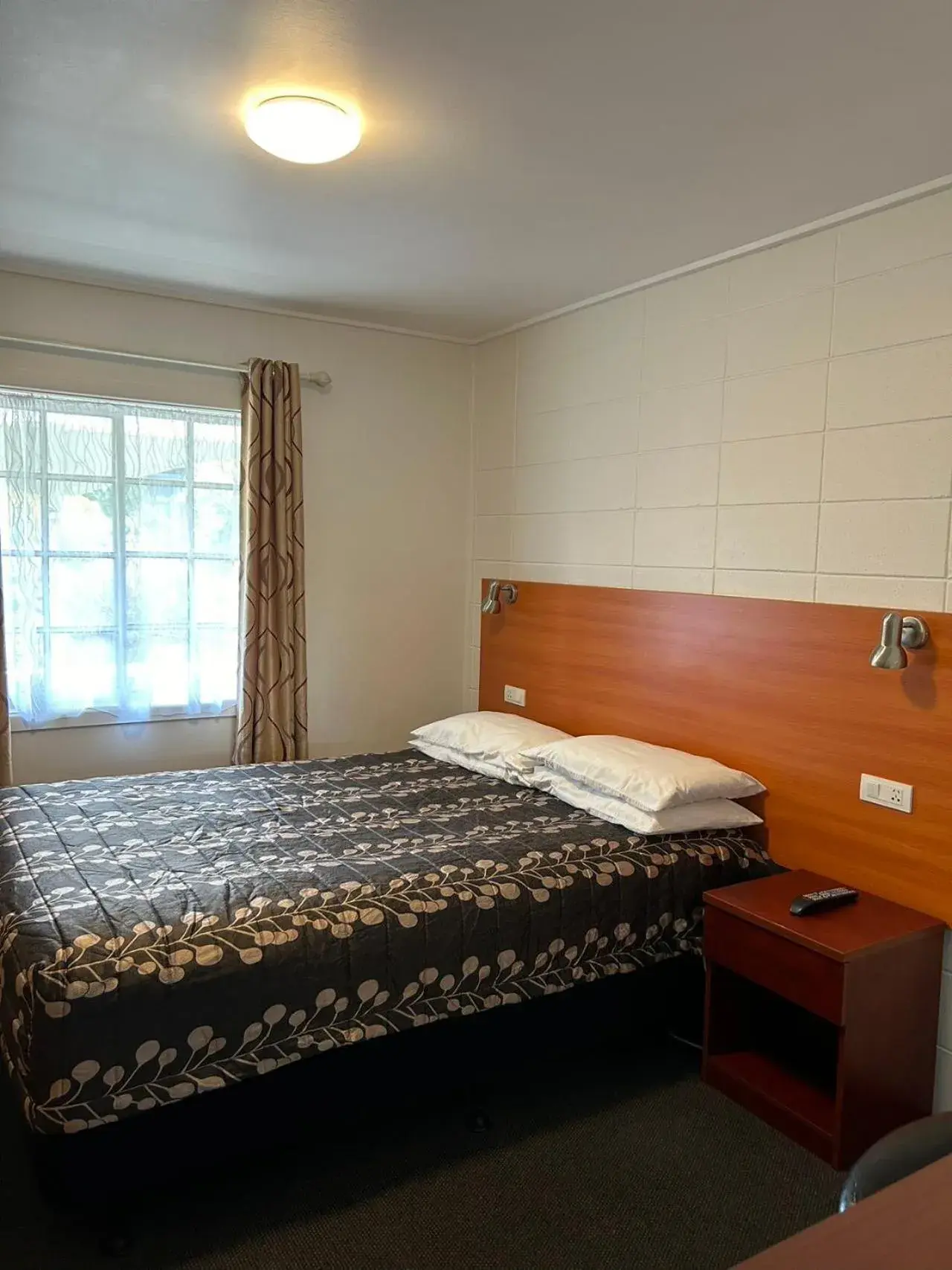 Bed in Tudor Motor Lodge Bed in Tudor Motor Lodge