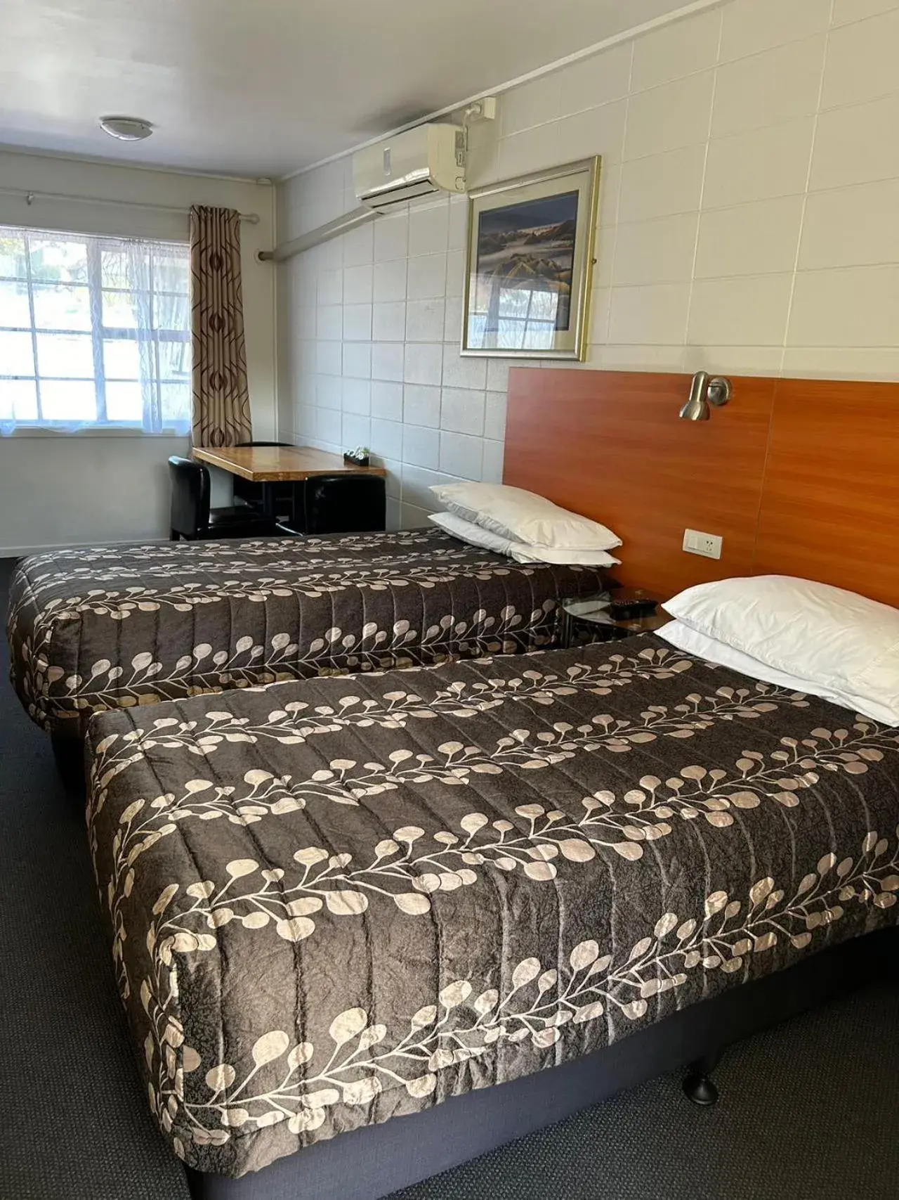 Bed in Tudor Motor Lodge Bed in Tudor Motor Lodge