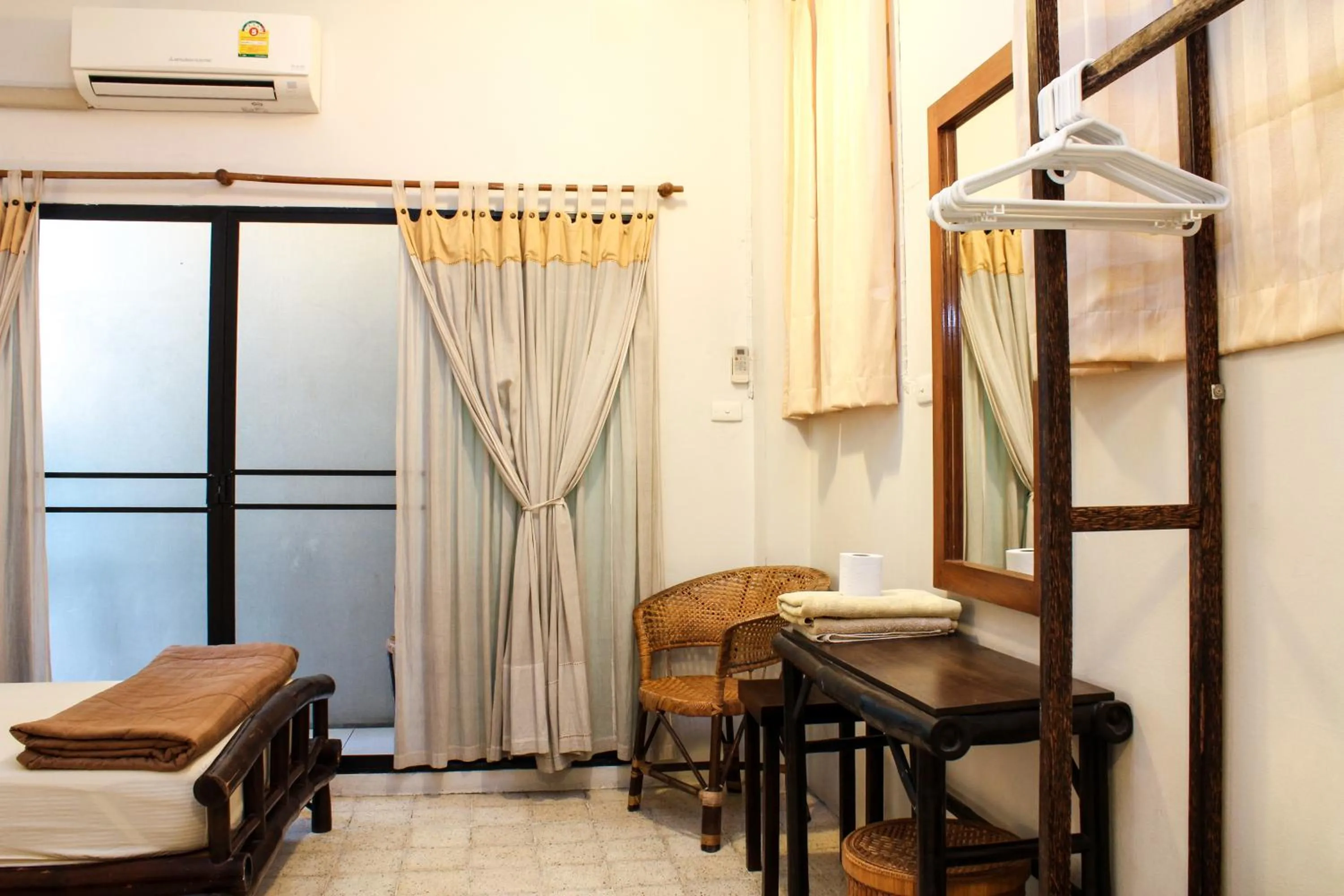 Bed in Lamphuhouse Bangkok