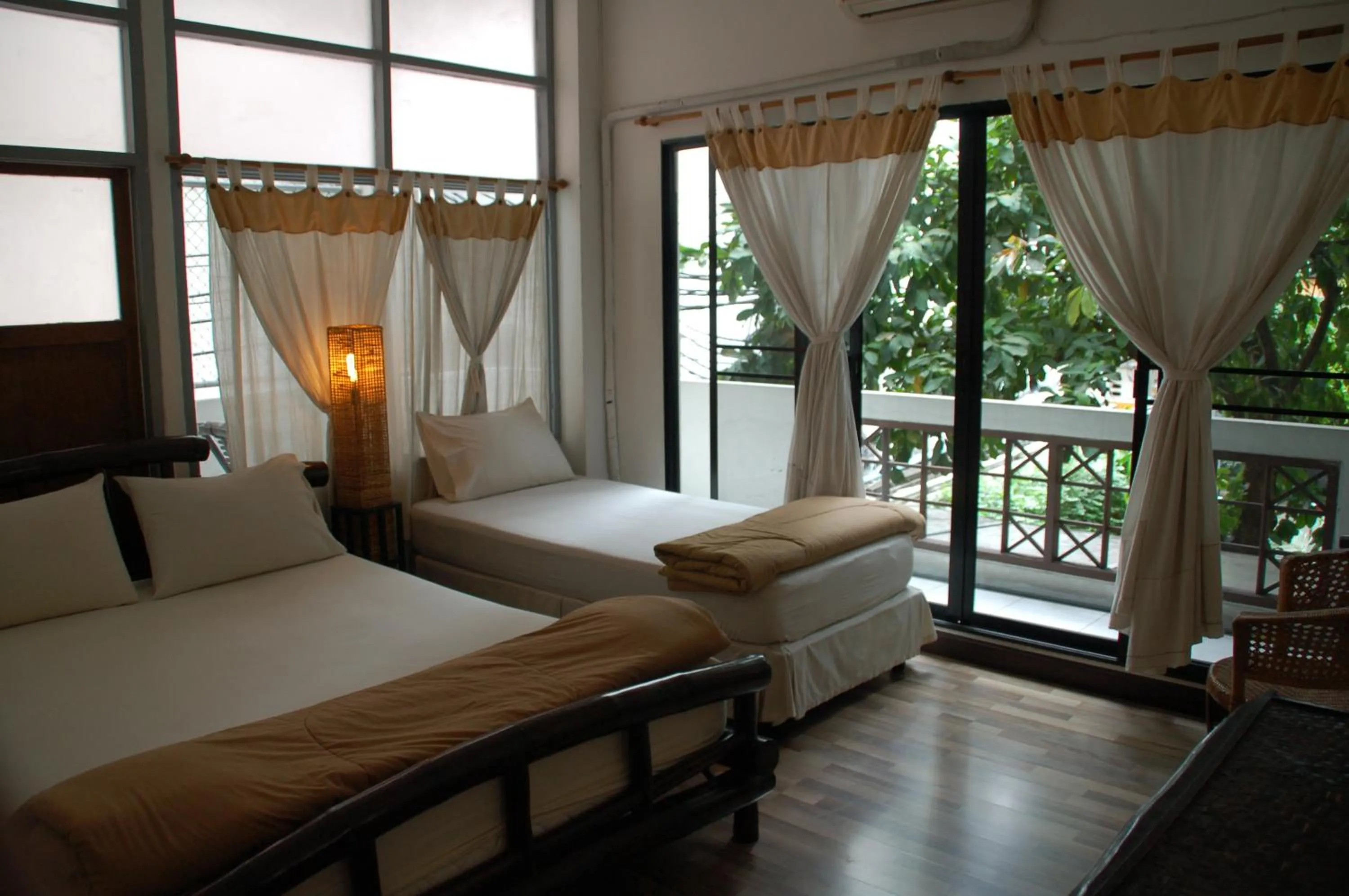 Bed in Lamphuhouse Bangkok