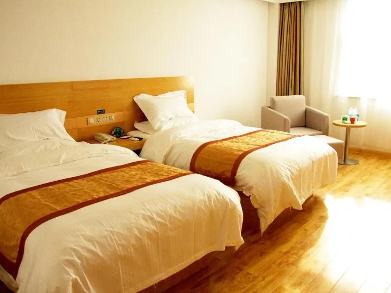 Bed in GreenTree Inn Shandong Laiwu Bus Station Express Hotel