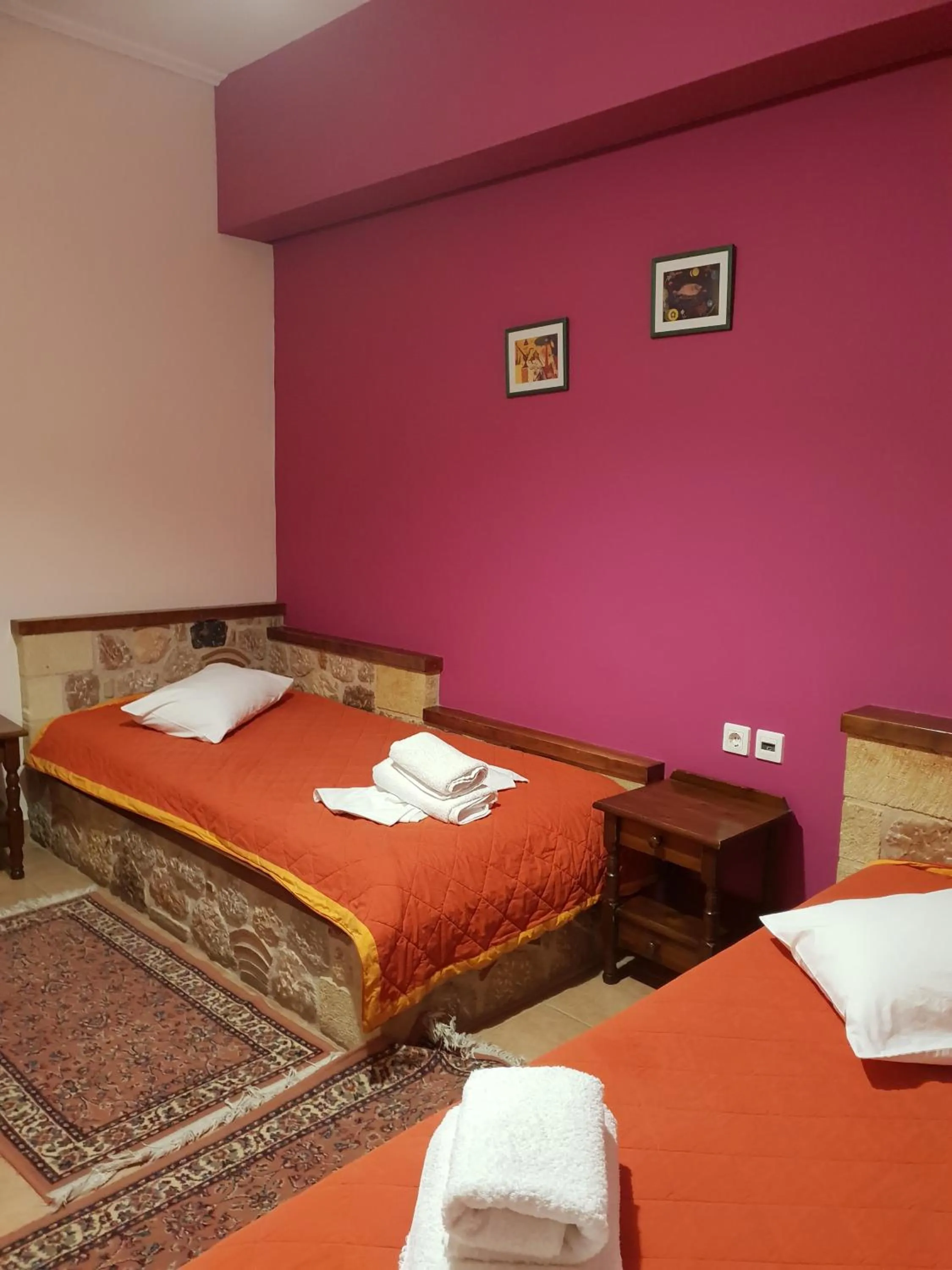 Bed in Aktaion Hotel