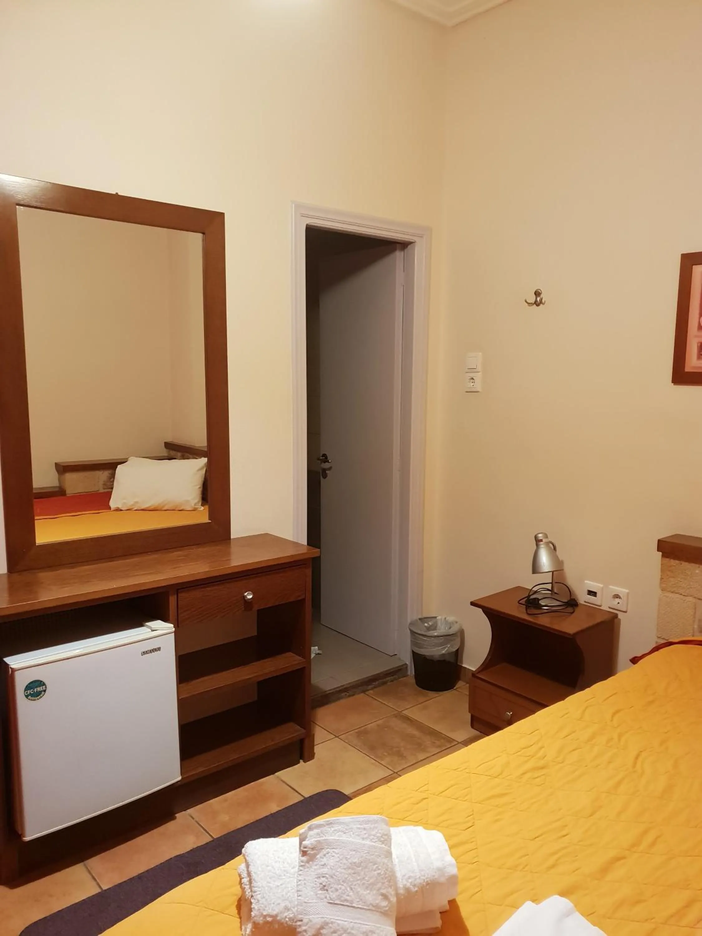 Bed in Aktaion Hotel