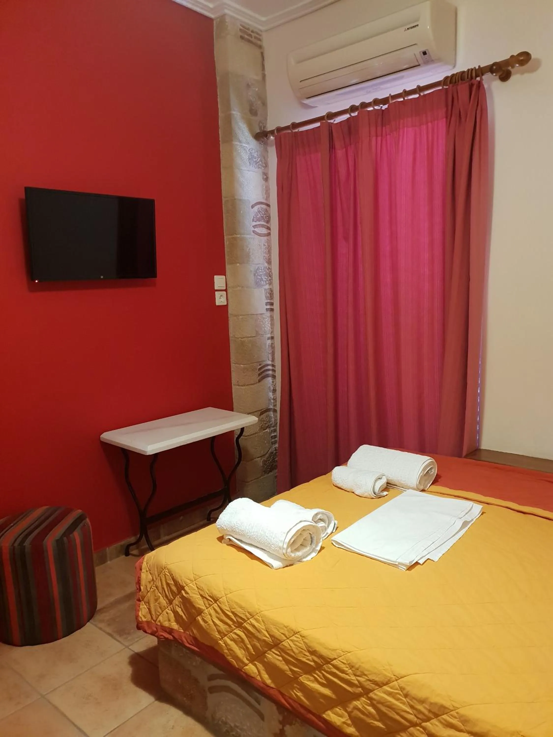 Bed in Aktaion Hotel