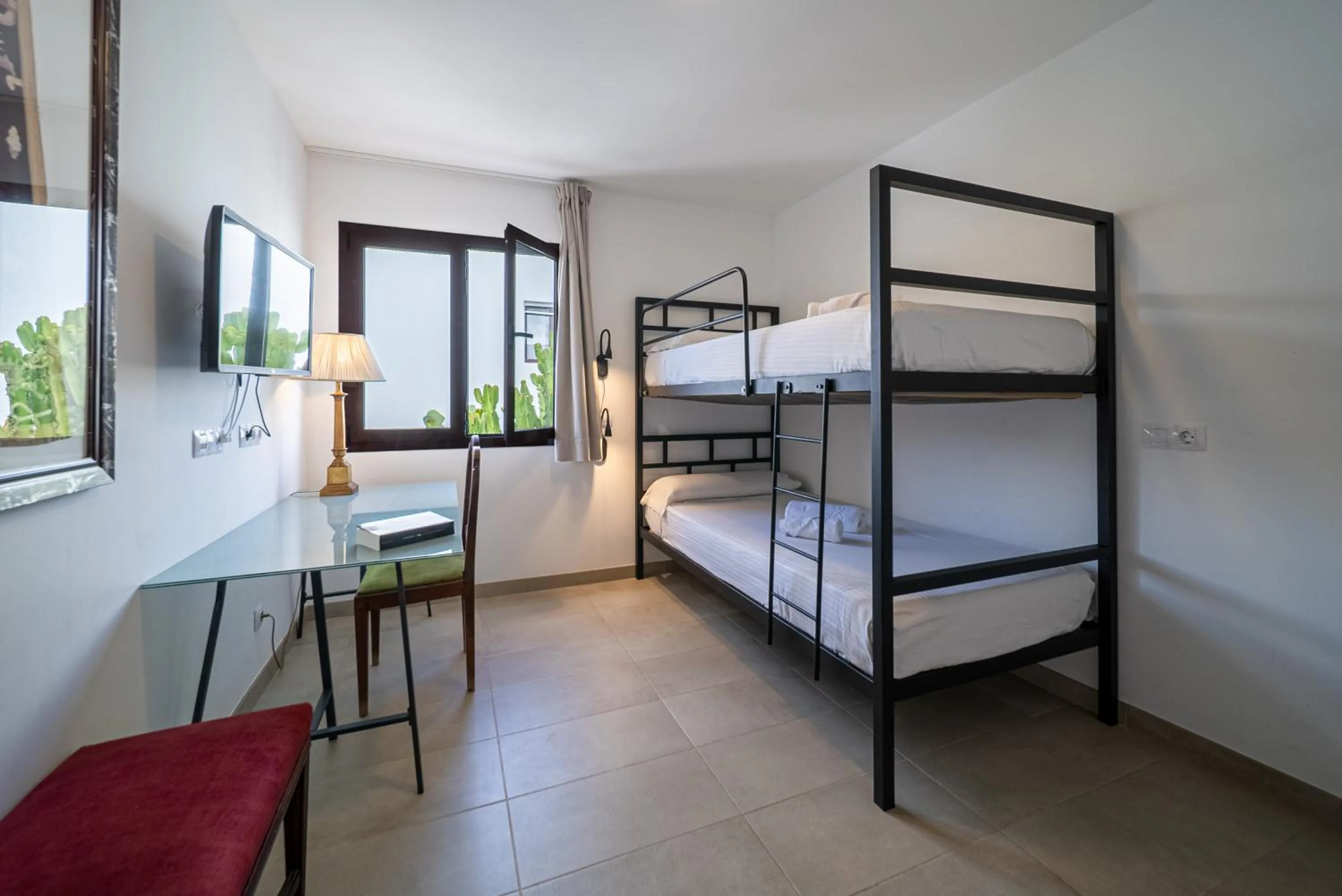 Seating area, Bed in La Casona de Yaiza I Hotel Emblematico