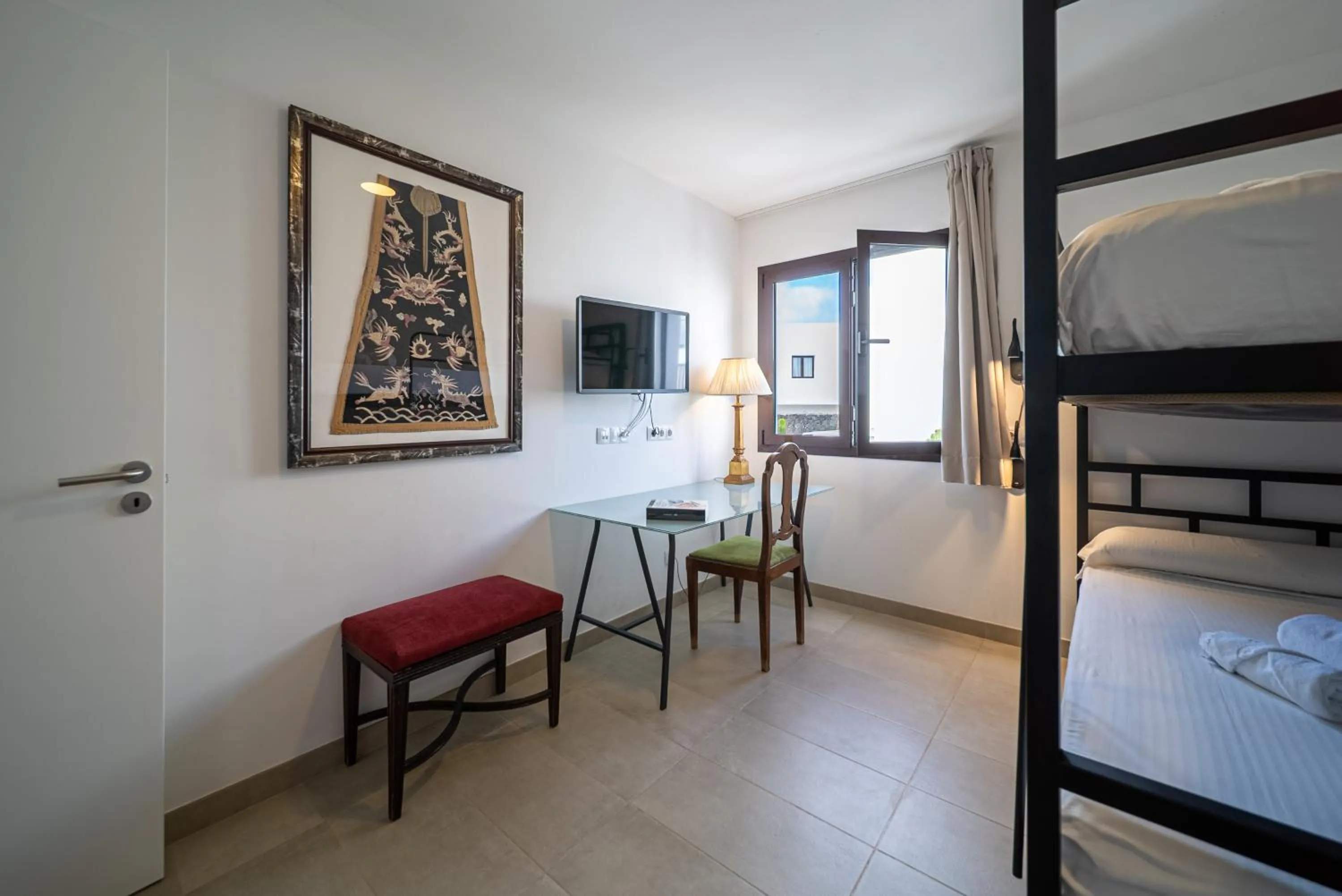 Seating area, Bed in La Casona de Yaiza I Hotel Emblematico