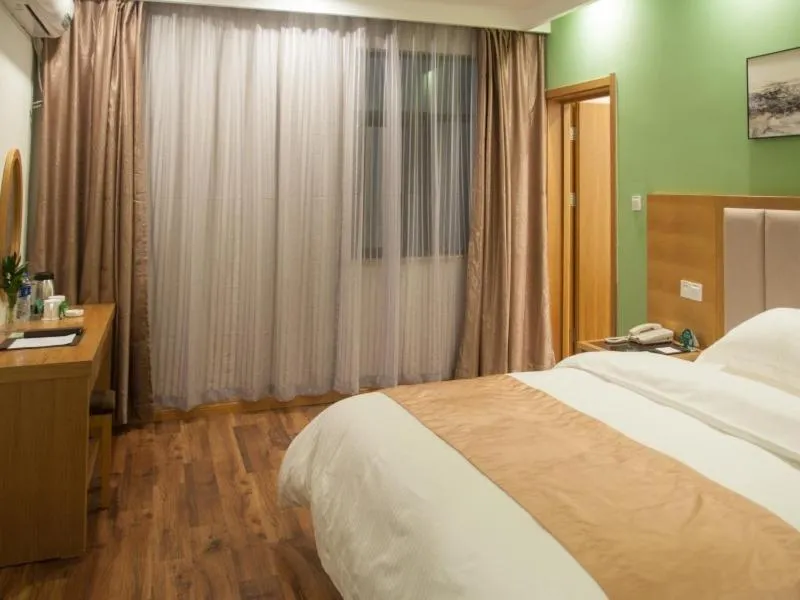 Bed in GreenTree Inn Suzhou Industrial Park Shengpu Town Xinsheng Road Express Hotel