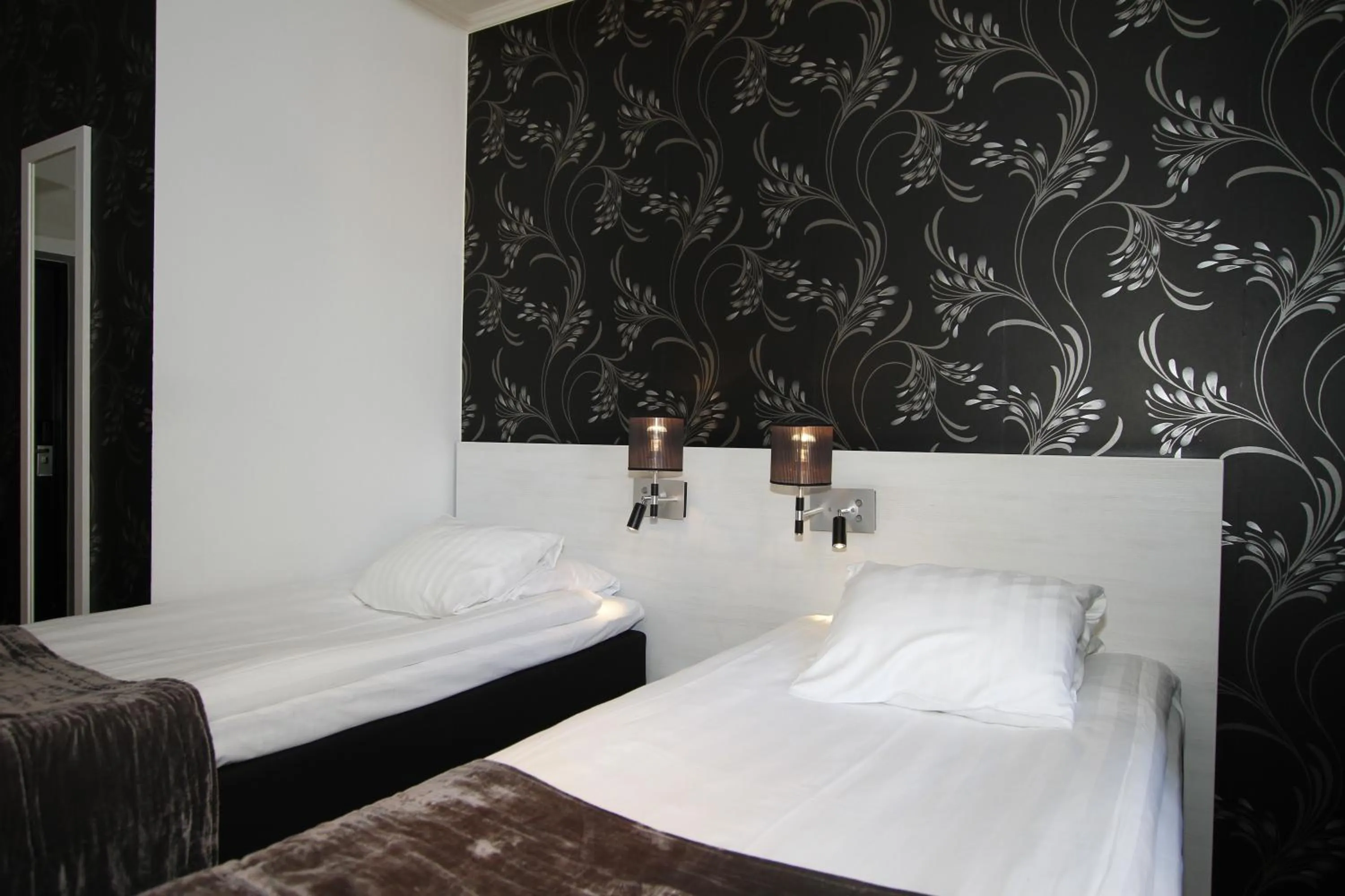 Bed in Donners Hotell