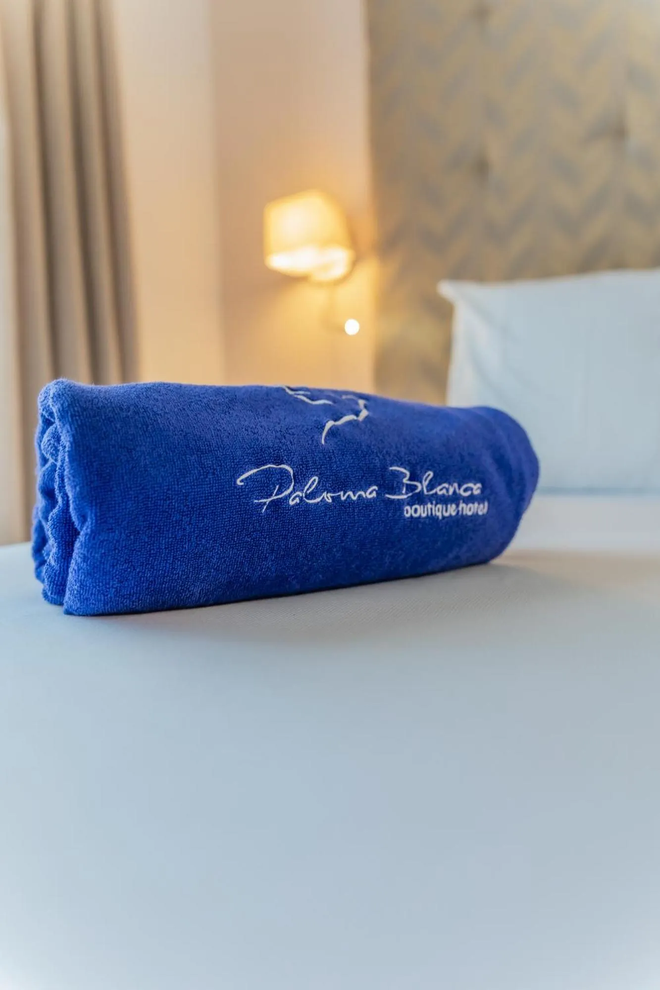 towels, Bed in Paloma Blanca Boutique Hotel