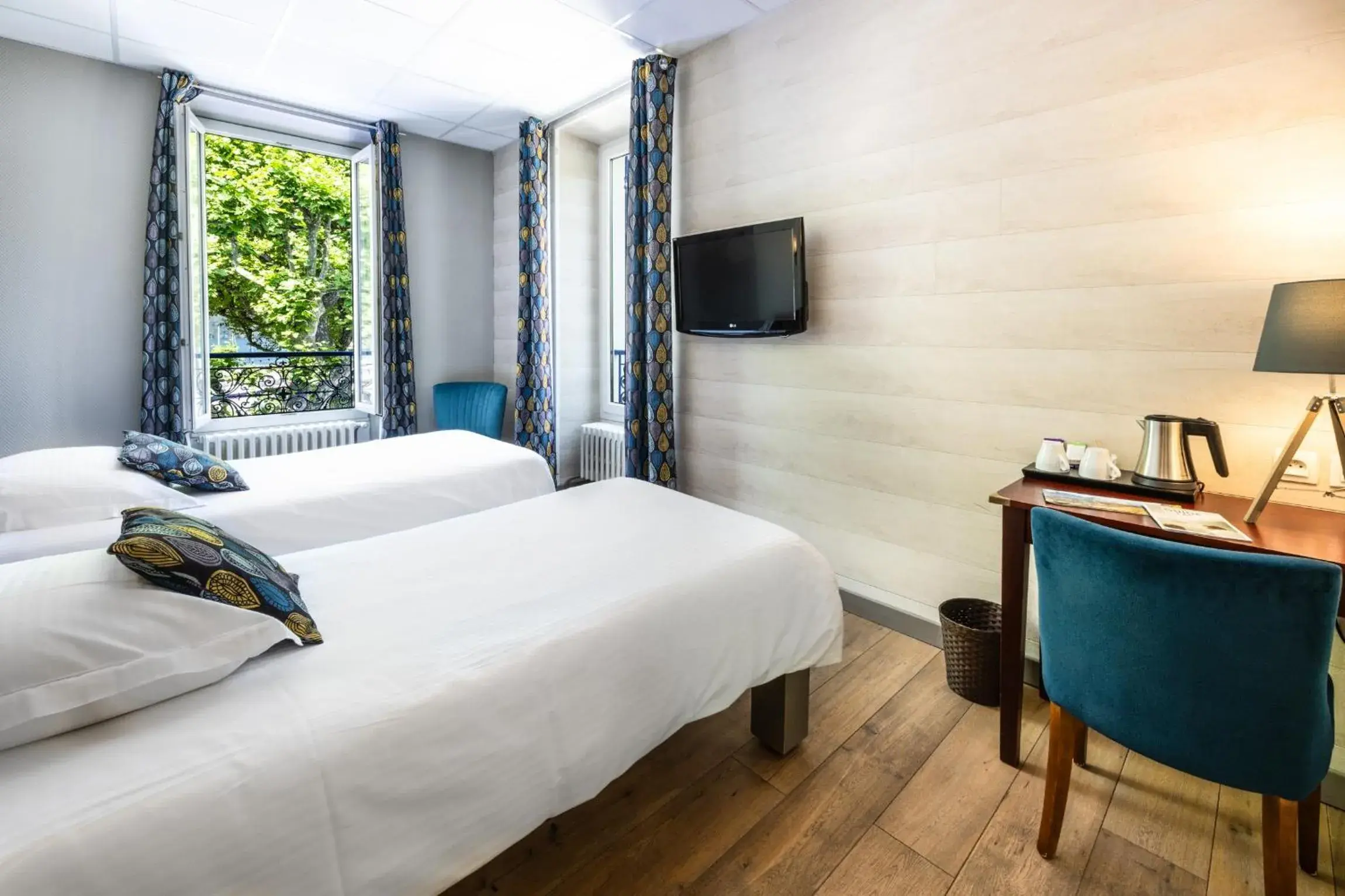 Twin Room in Hotel Beau Rivage Twin Room in Hotel Beau Rivage