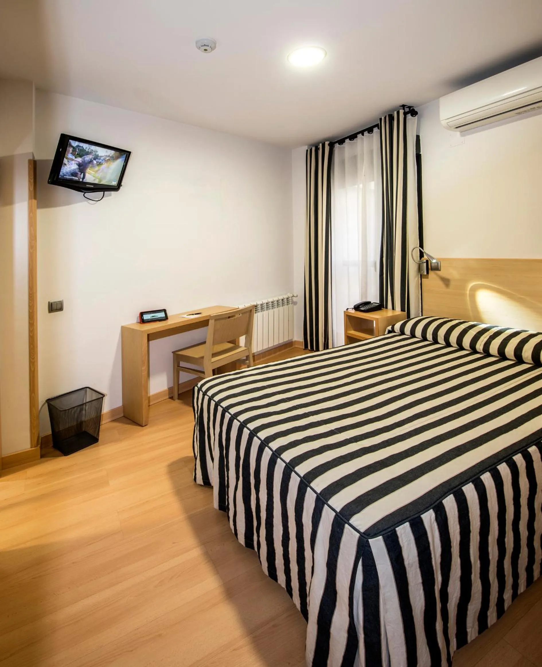 Bed in Hotel Puerta de la Santa