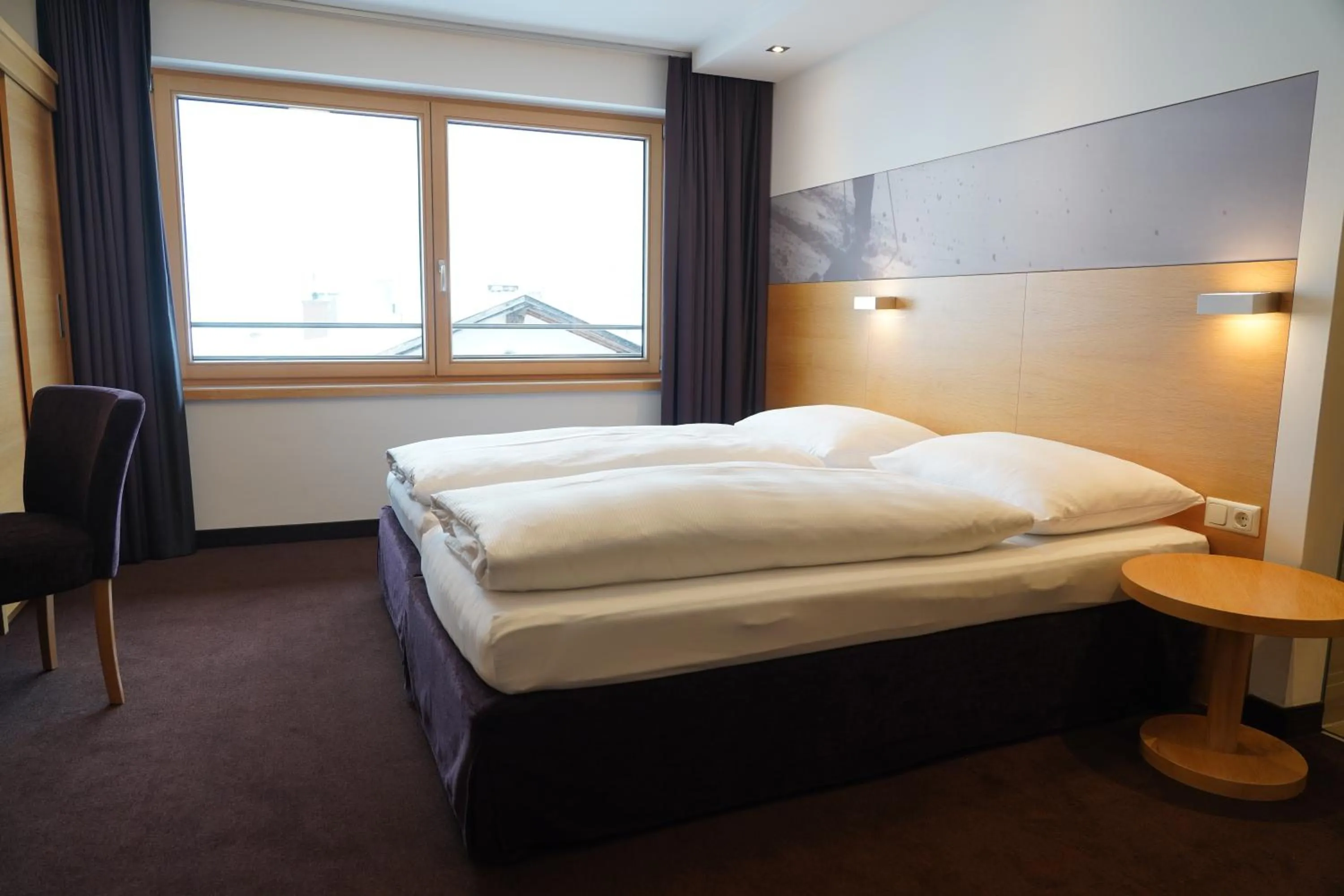 Bedroom, Bed in Quality Hosts Arlberg - Hotel Goldenes Kreuz B&B