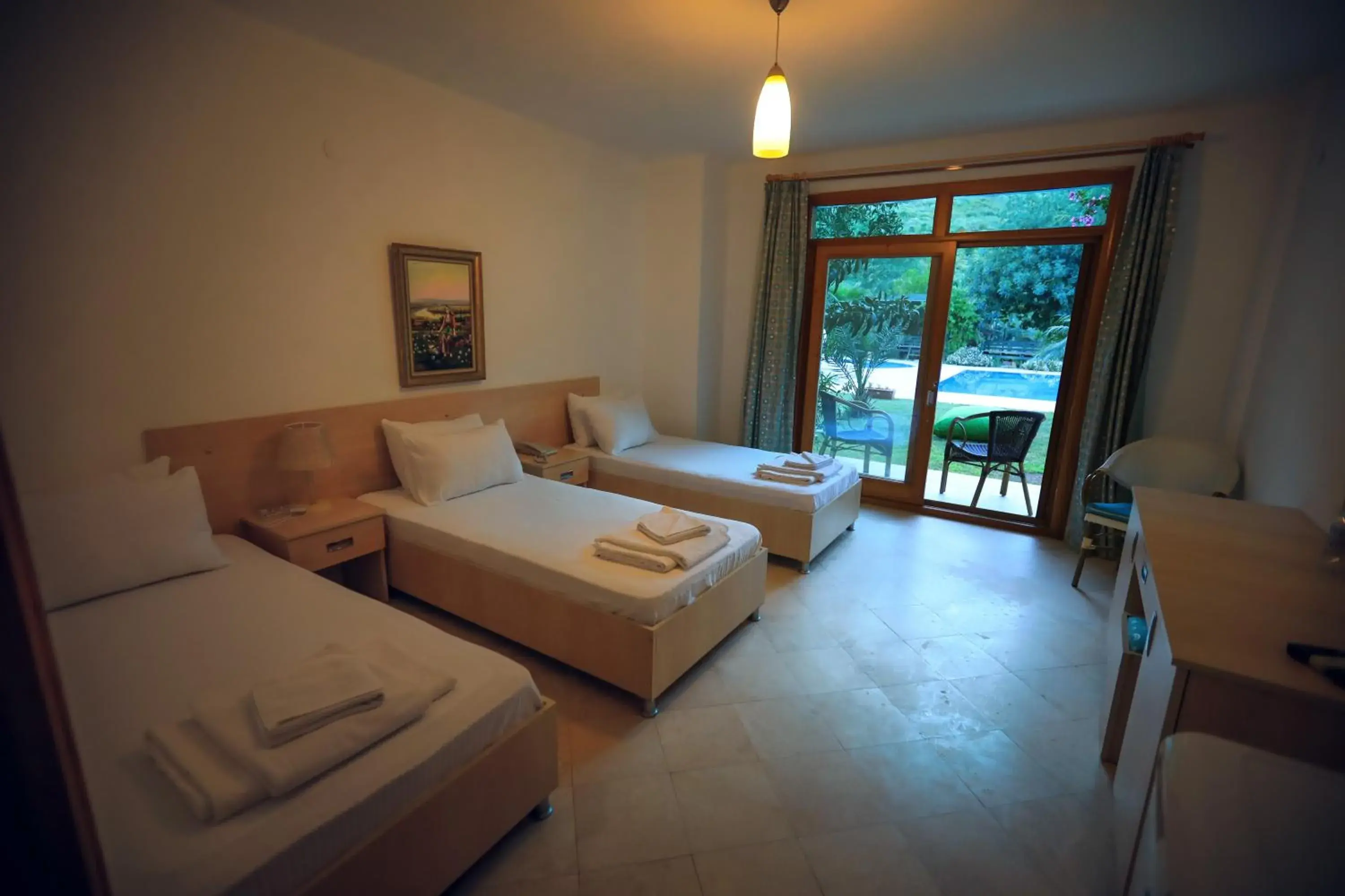 Bed in Yonca Hotel Bed in Yonca Hotel