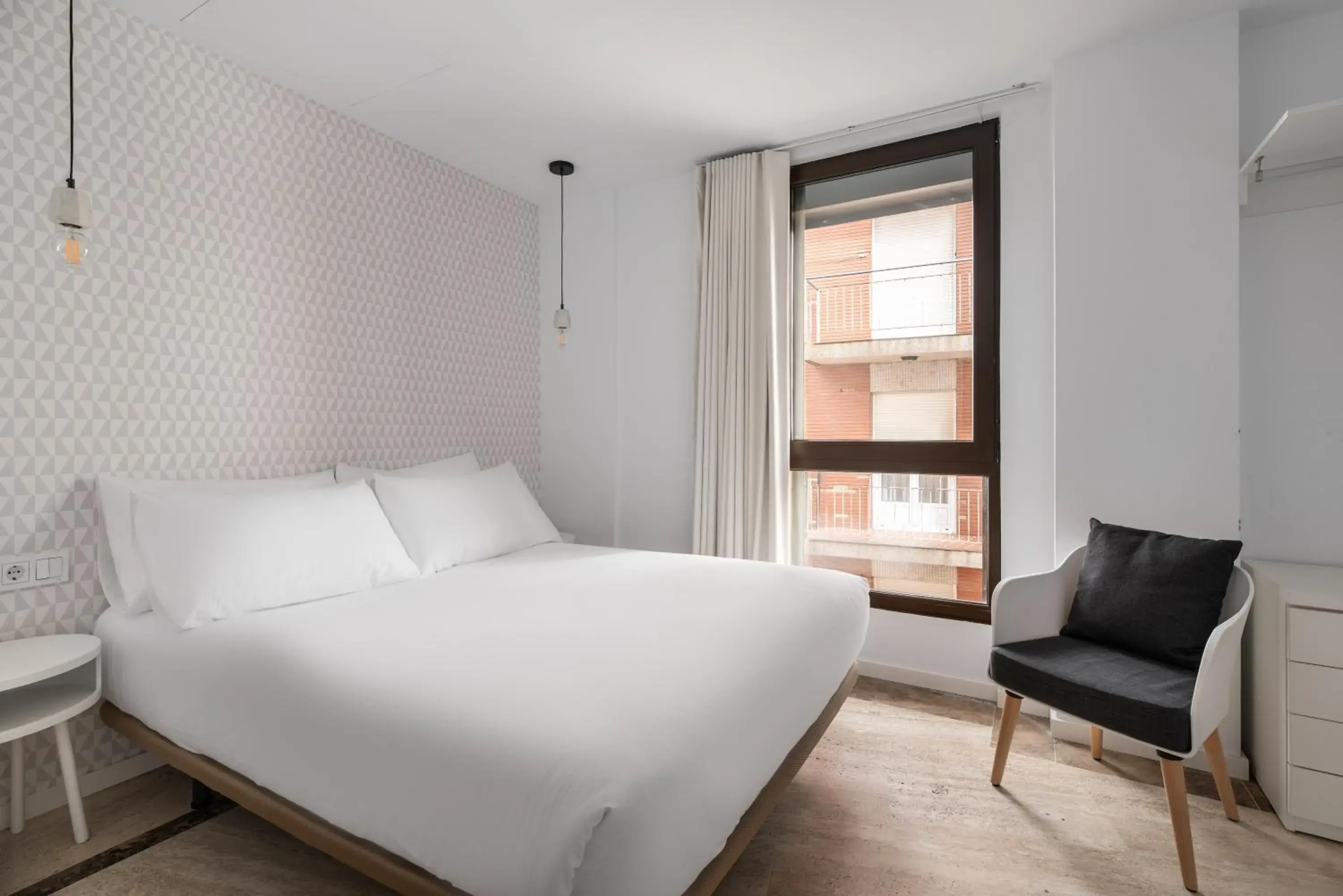 Bed in Apartamentos Suite The Way Bed in Apartamentos Suite The Way