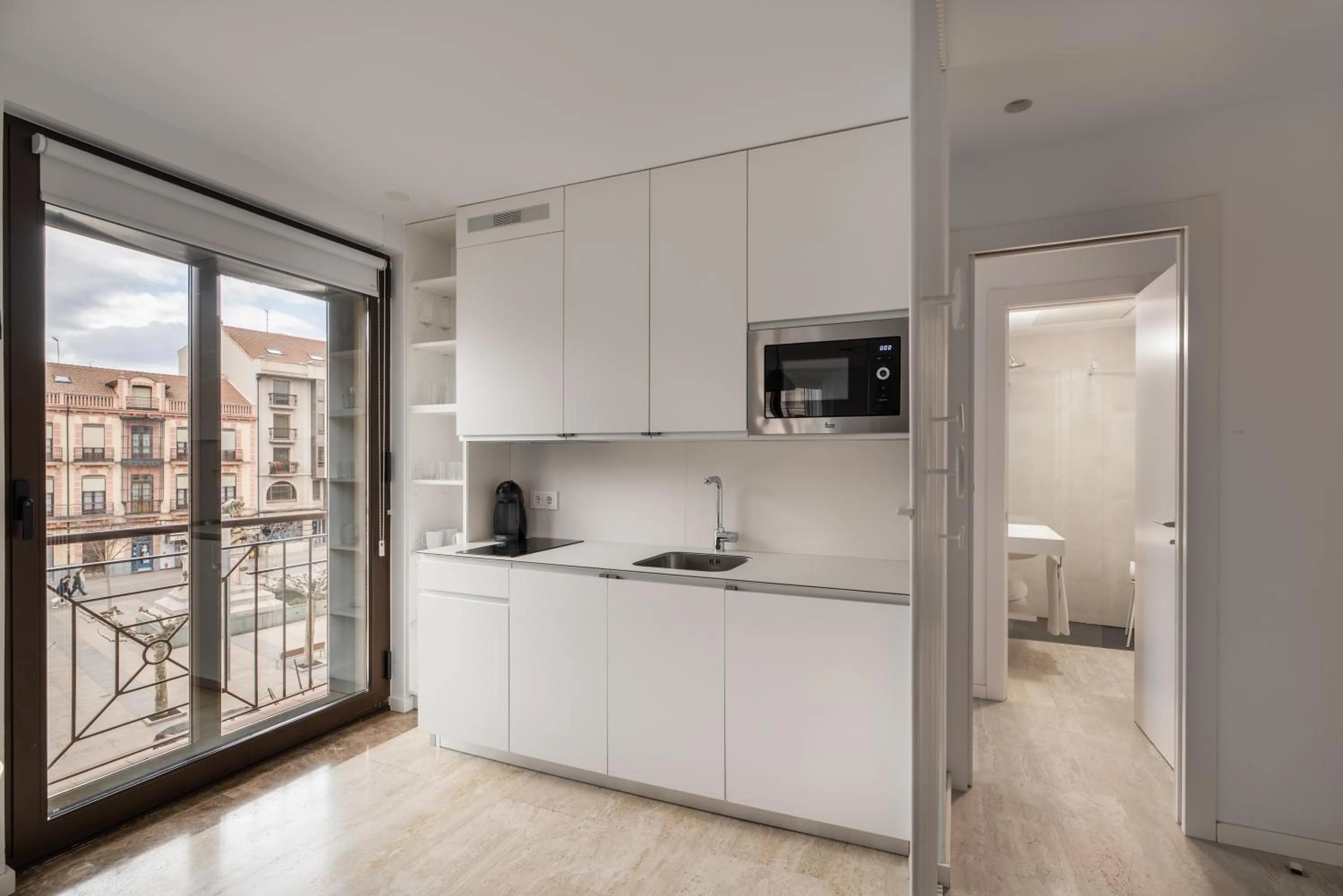 Kitchen or kitchenette in Apartamentos Suite The Way
