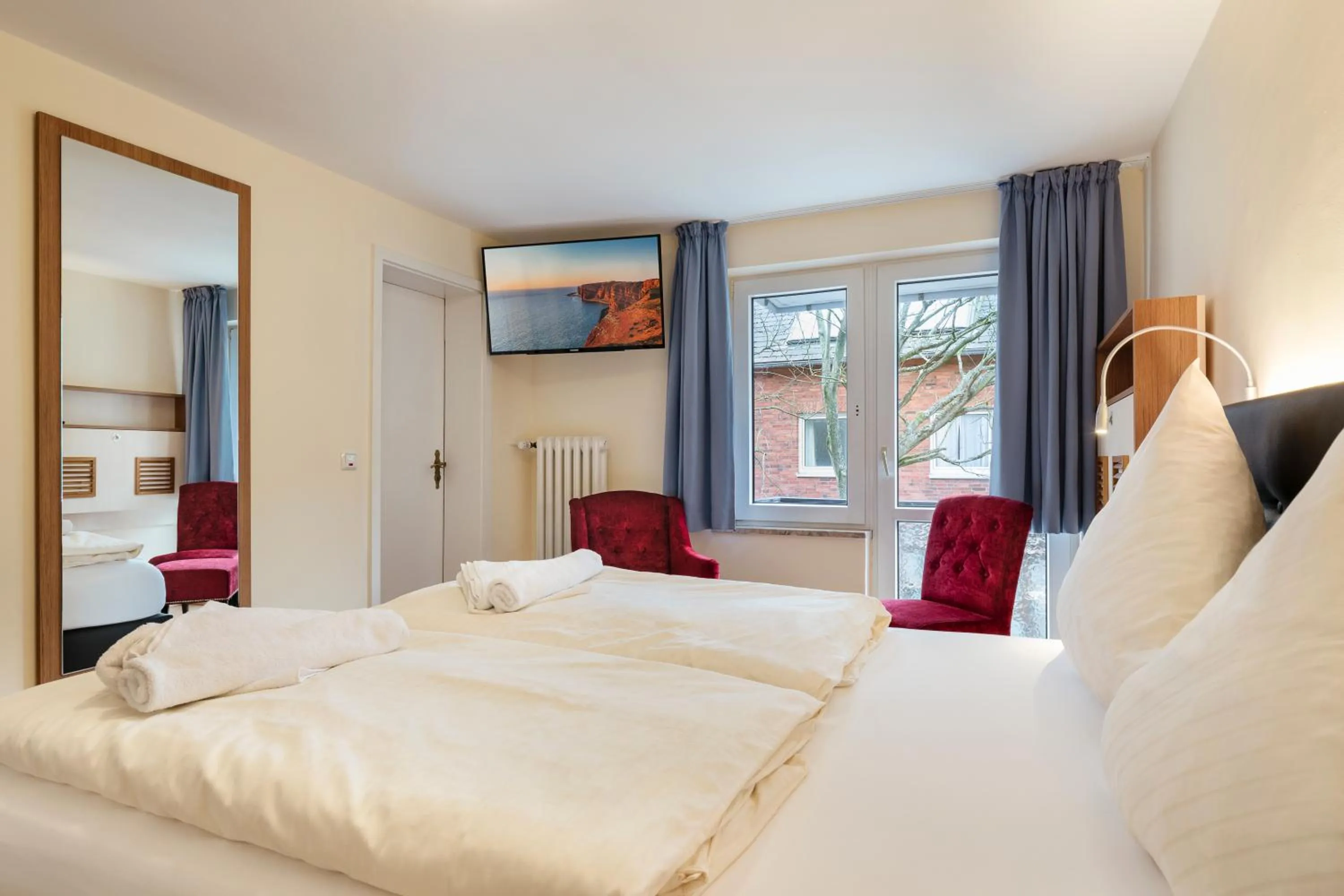 Bed in Hotel Helgolandia