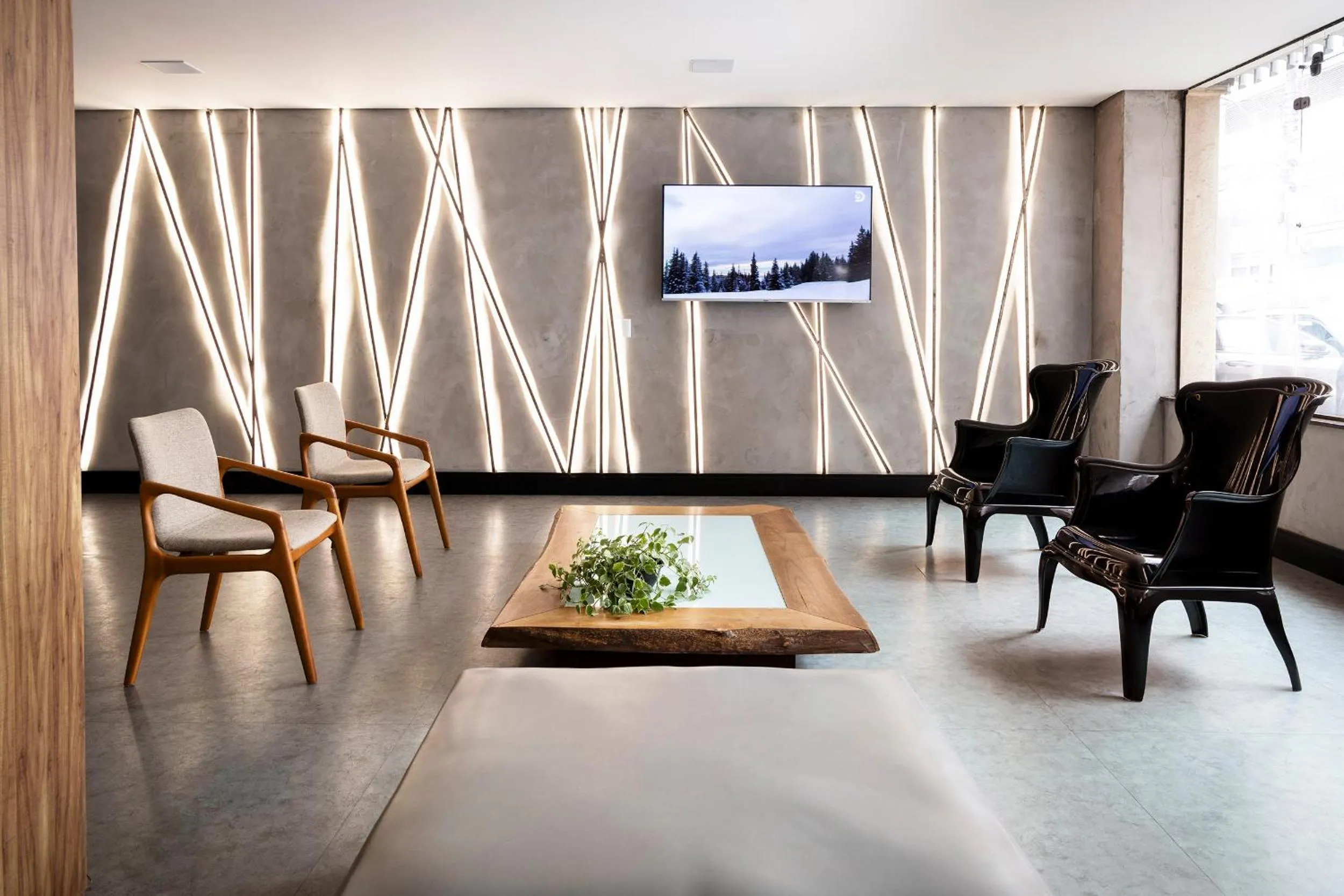 Communal lounge/ TV room in HM Hotel